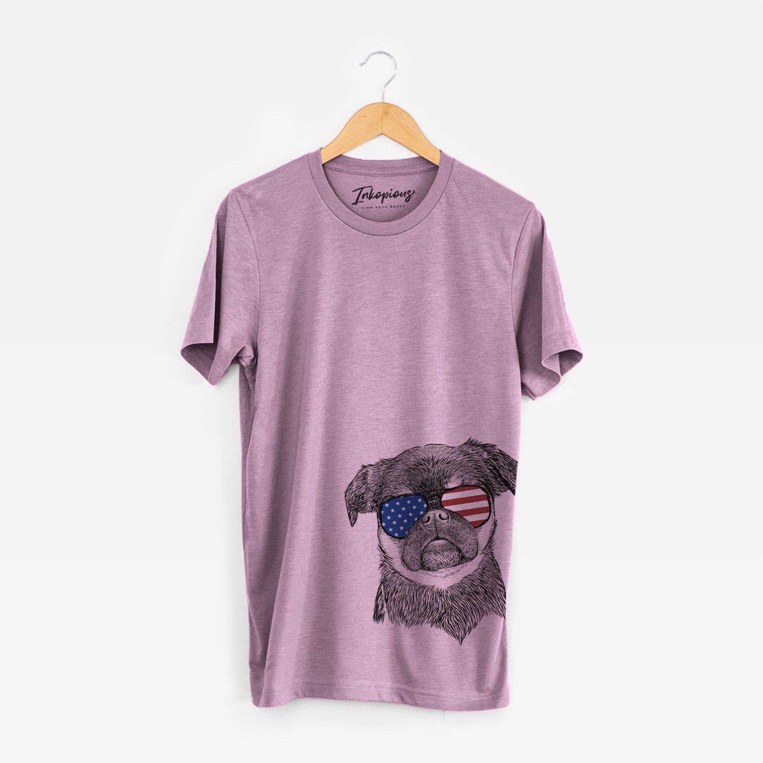 Hand-drawn sketch of Simone the Brussels Griffon wearing American flag sunglasses on an Orchid Unisex crewneck