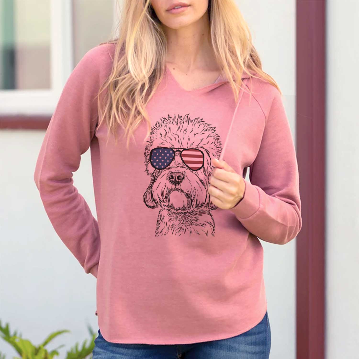 Hand-drawn sketch of Sir Walter the Dandie Dinmont Terrier wearing American flag sunglasses on a Dusty Rose Cali Wave Hooded Sweatshirt, lifestyle photo