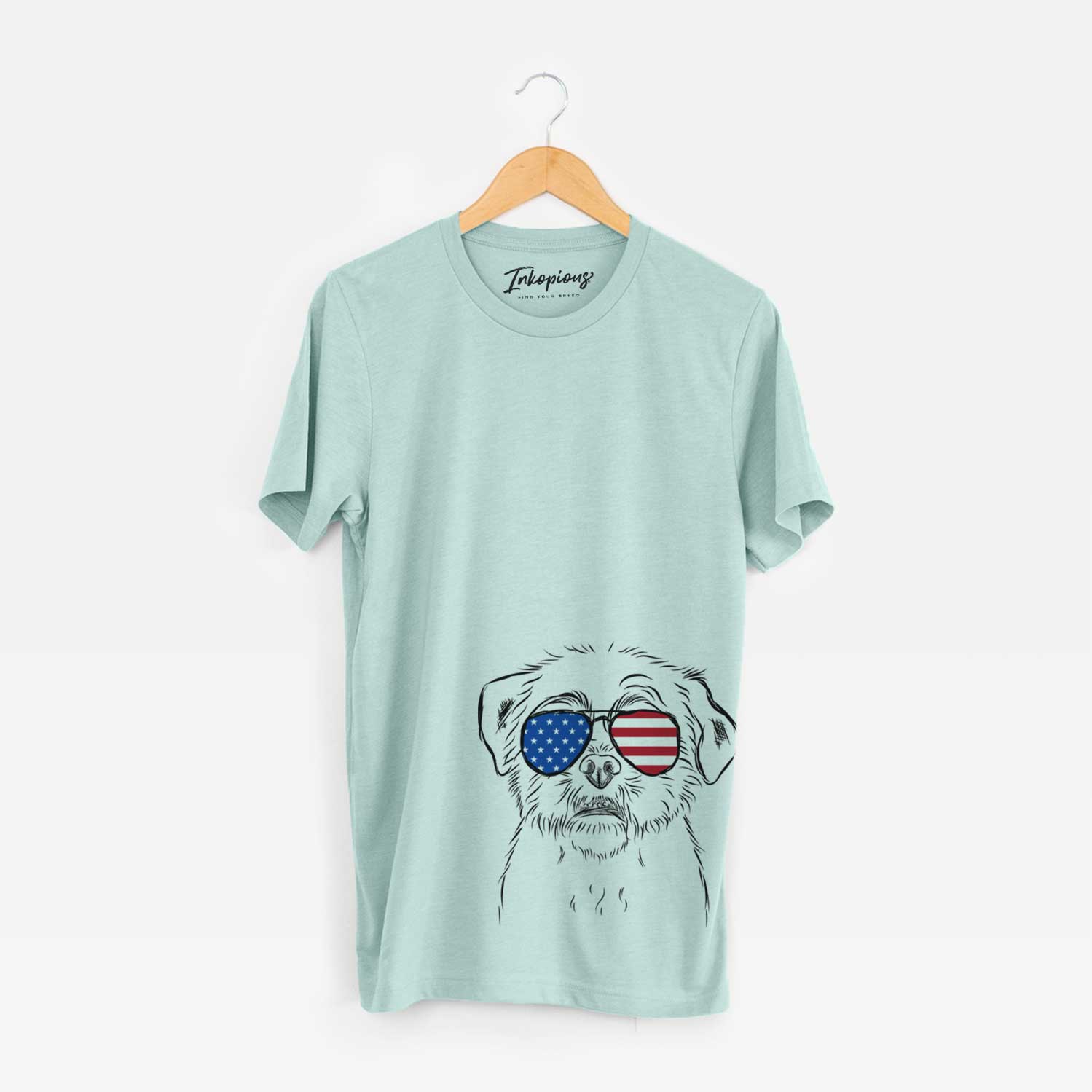 Hand-drawn sketch of Smash the Shih Tzu wearing American flag sunglasses on a Heather Sage Unisex crewneck