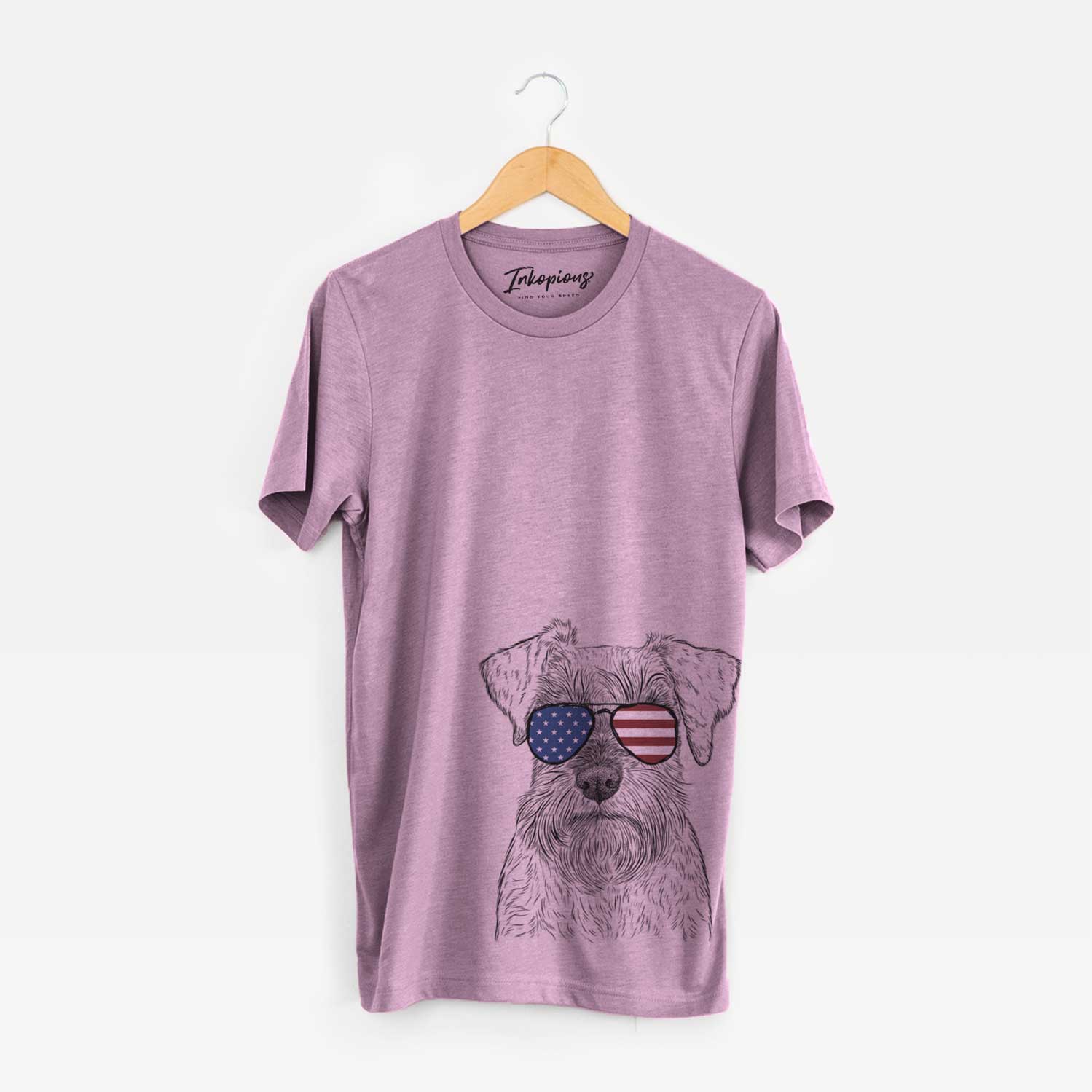Hand-drawn sketch of Smokey the Miniature Schnauzer wearing American flag sunglasses on an Orchid Unisex crewneck