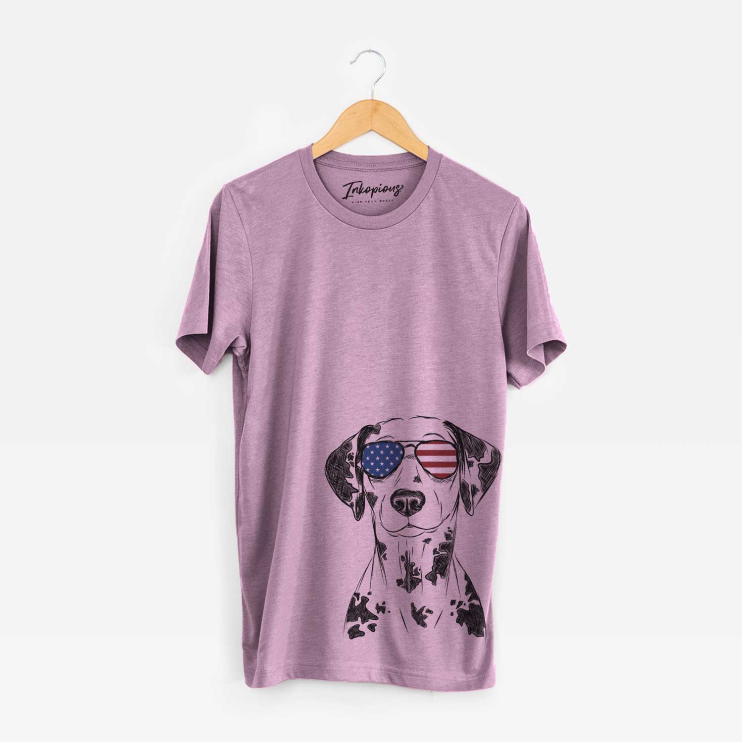 Hand-drawn sketch of Spot the Dalmatian wearing American flag sunglasses on an Orchid Unisex crewneck
