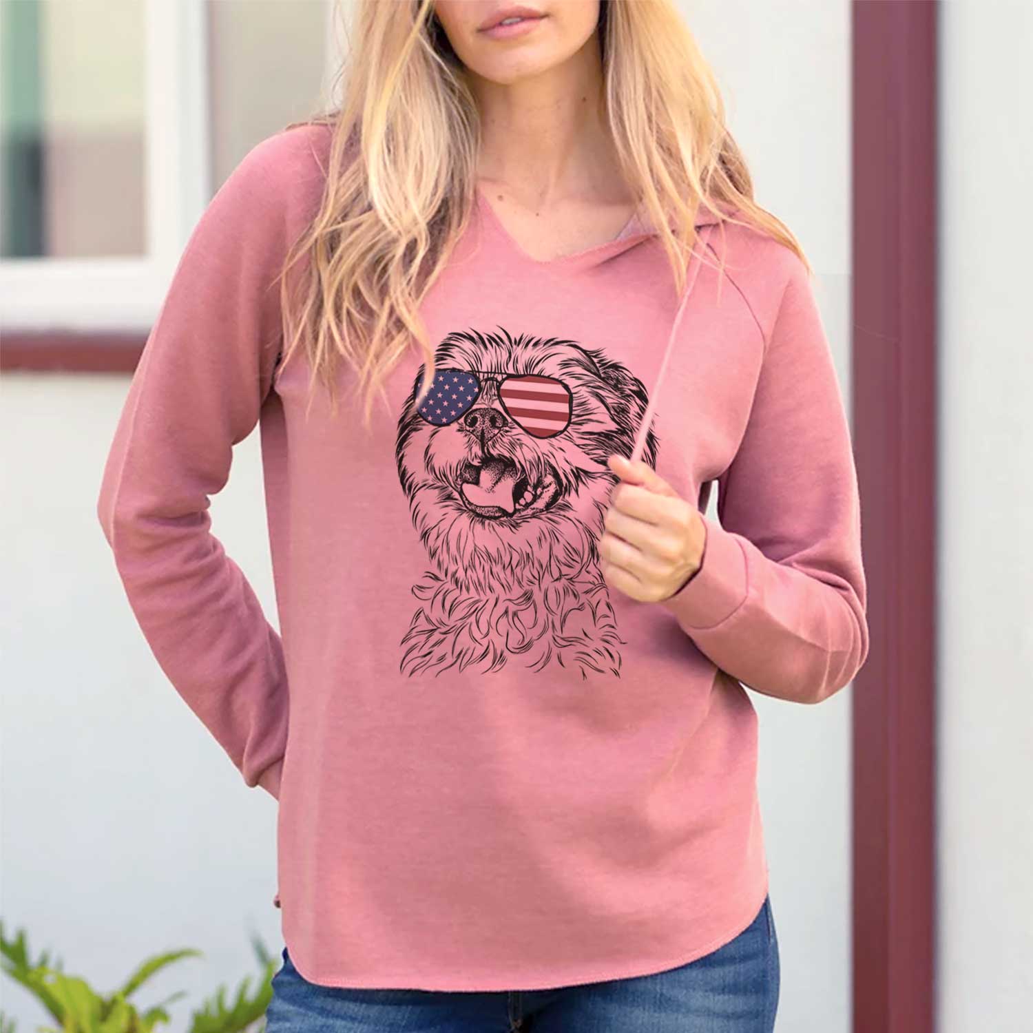 Hand-drawn sketch of Sugar the Malshi wearing American flag sunglasses on a Dusty Rose Cali Wave Hooded Sweatshirt, lifestyle photo