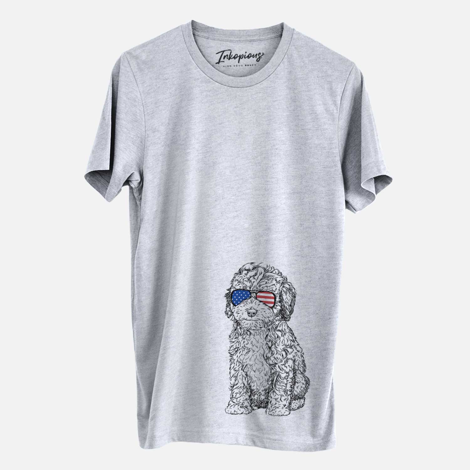 Hand-drawn sketch of Sweet Tea the Mini Doodle wearing American flag sunglasses on a Grey Unisex crewneck