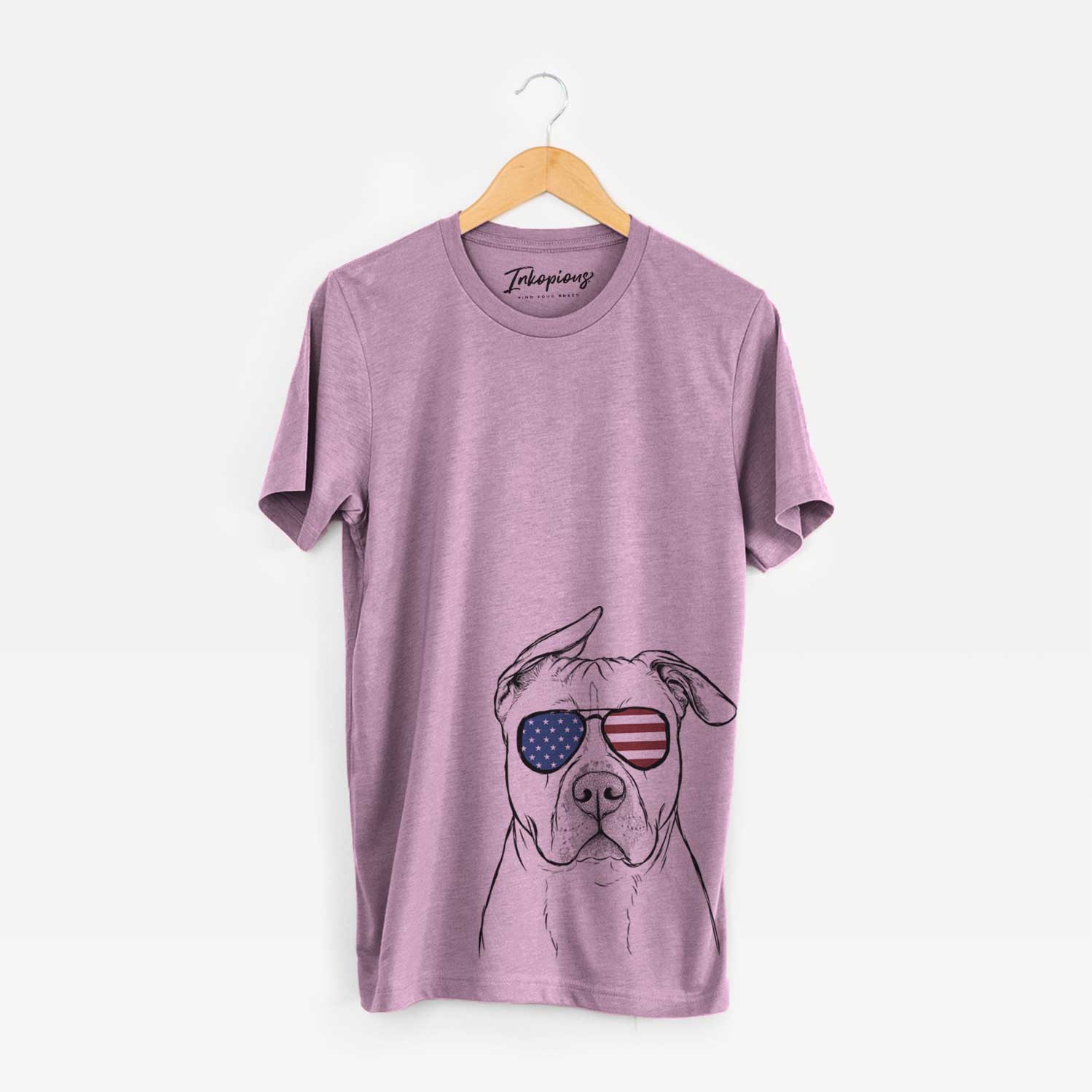 Hand-drawn sketch of Teddy Jam the Pitbull wearing American flag sunglasses on an Orchid Unisex crewneck