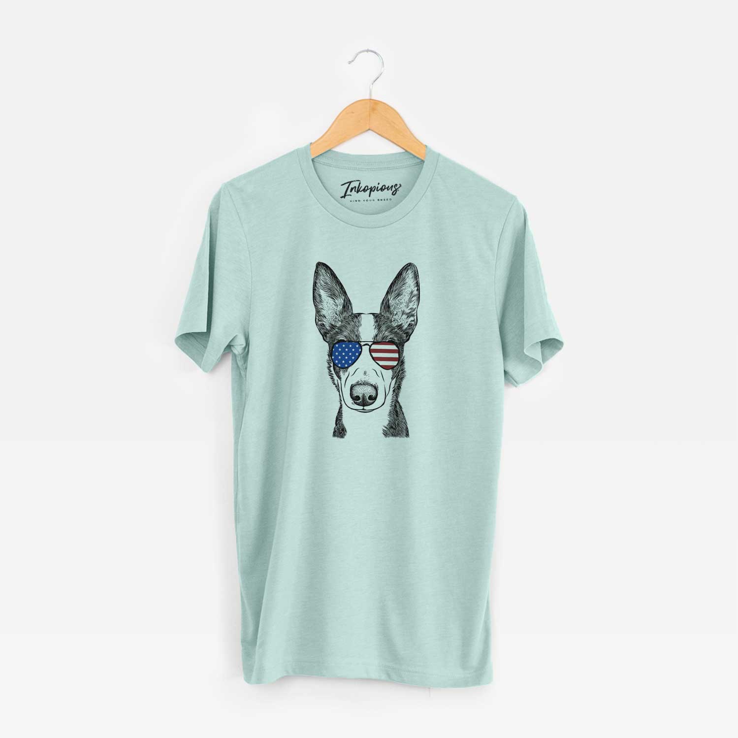 Hand-drawn sketch of Tigm the Bippet wearing American flag sunglasses on a Heather Sage Unisex crewneck