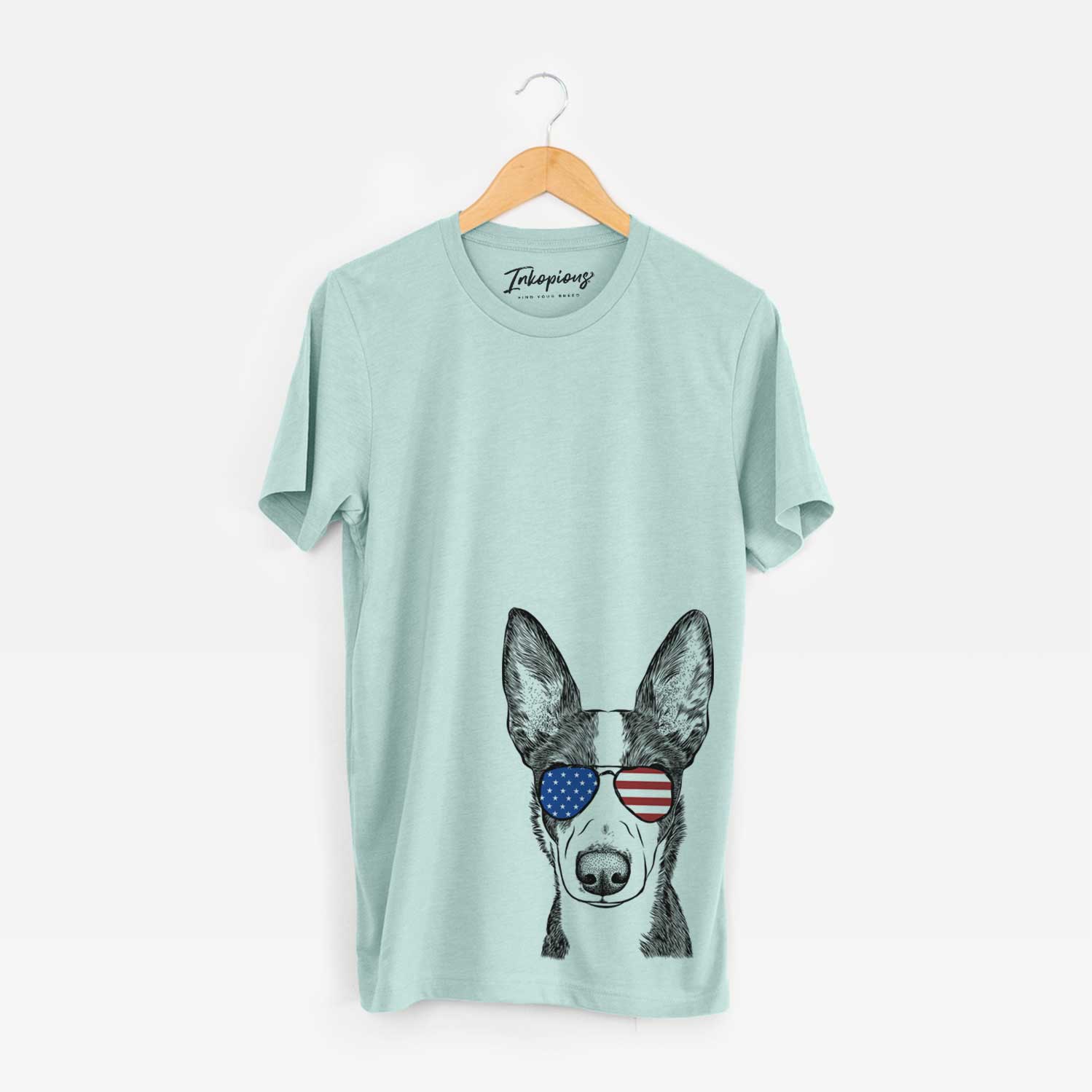 Hand-drawn sketch of Tigm the Bippet wearing American flag sunglasses on a Heather Sage Unisex crewneck
