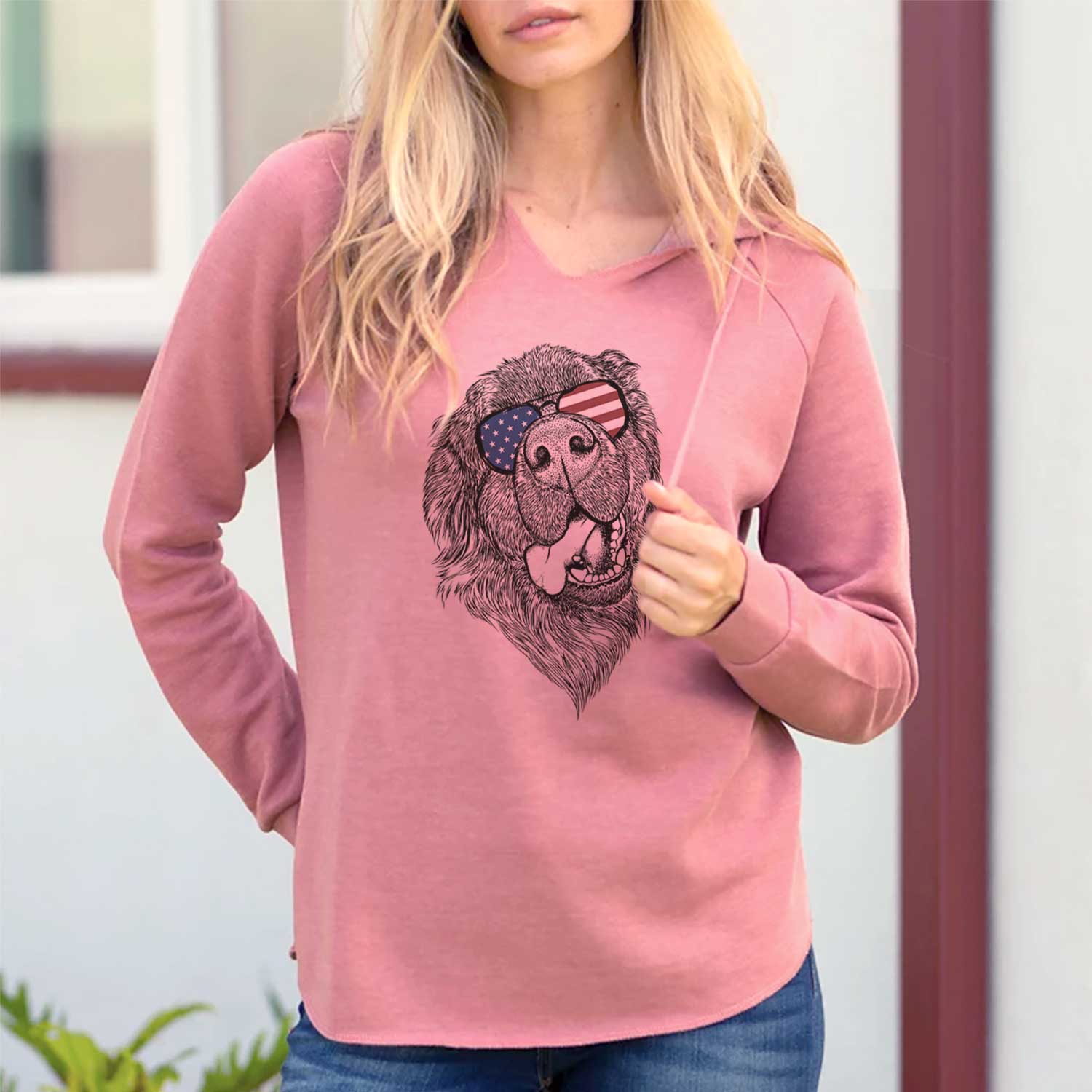 Hand-drawn sketch of Tuna the Newfoundland wearing American flag sunglasses on a Dusty Rose Cali Wave Hooded Sweatshirt, lifestyle photo