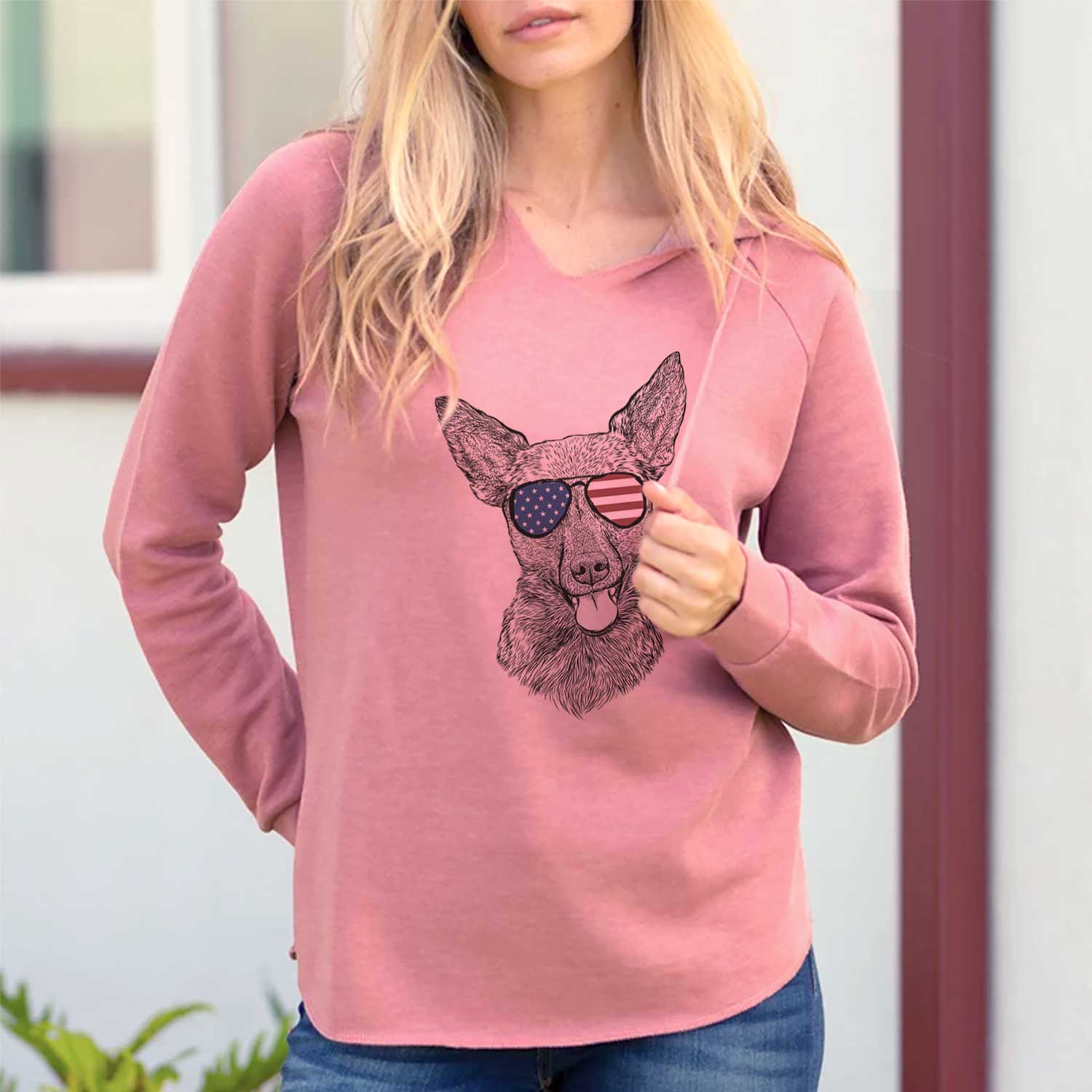 Hand-drawn sketch of Ursa the Mixed Breed wearing American flag sunglasses on a Dusty Rose Cali Wave Hooded Sweatshirt, lifestyle photo