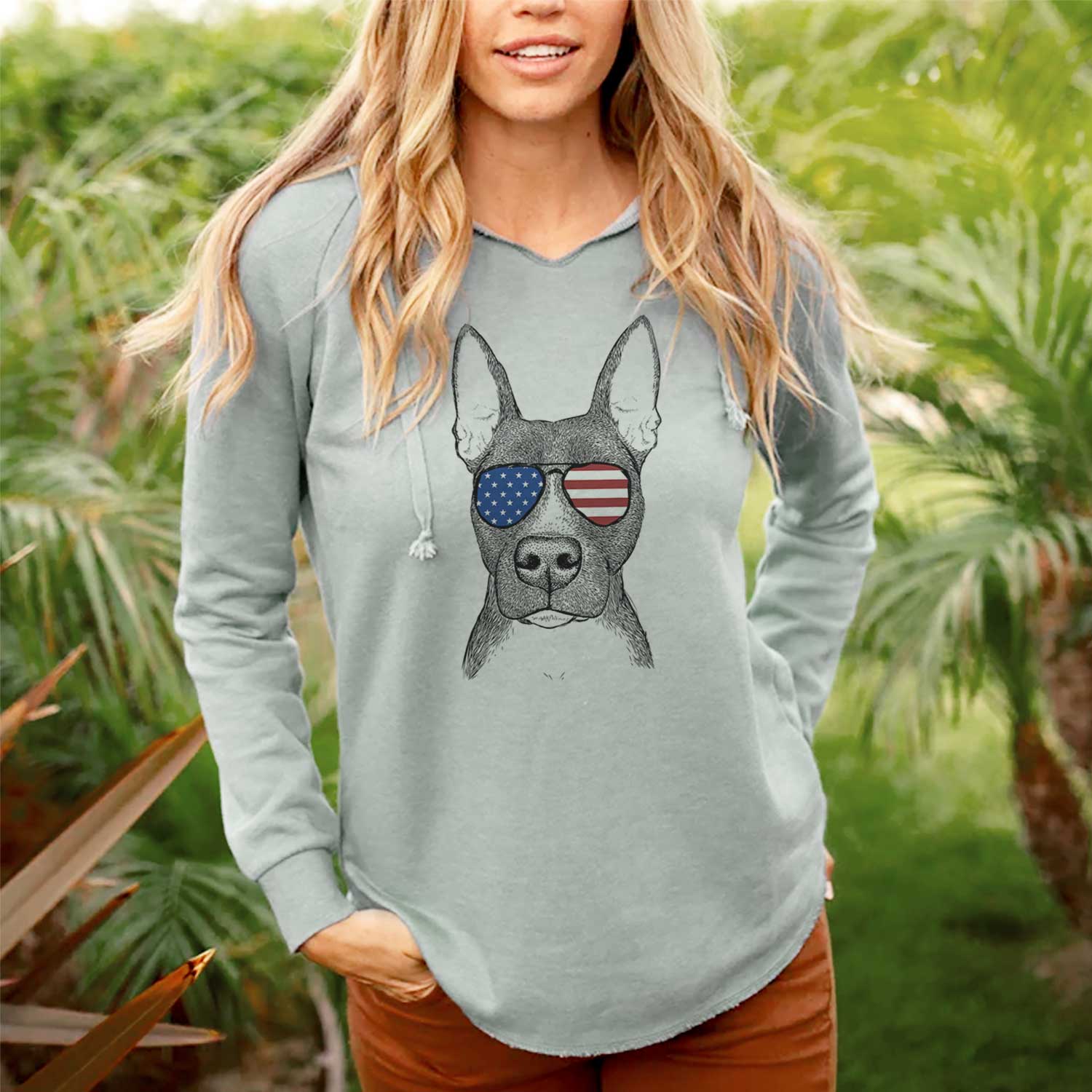 Hand-drawn sketch of Violet the Pitbull wearing American flag sunglasses on a Sage Cali Wave Hooded Sweatshirt, lifestyle photo