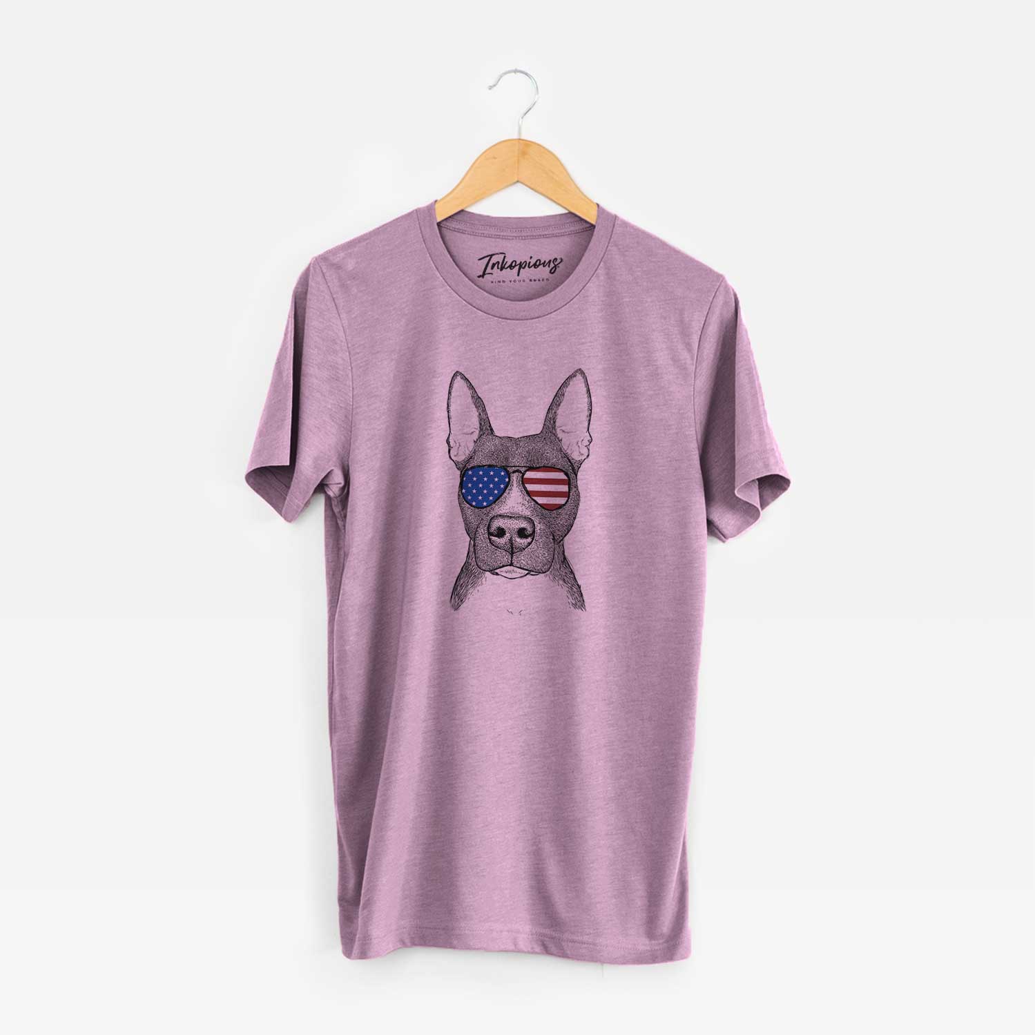 Hand-drawn sketch of Violet the Pitbull wearing American flag sunglasses on an Orchid Unisex crewneck