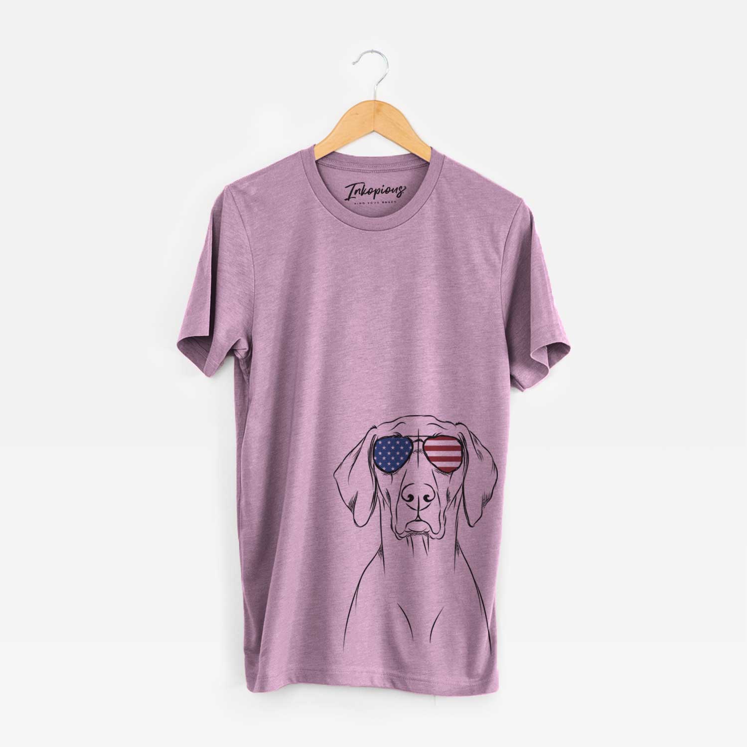 Hand-drawn sketch of Walter the Weimaraner wearing American flag sunglasses on an Orchid Unisex crewneck