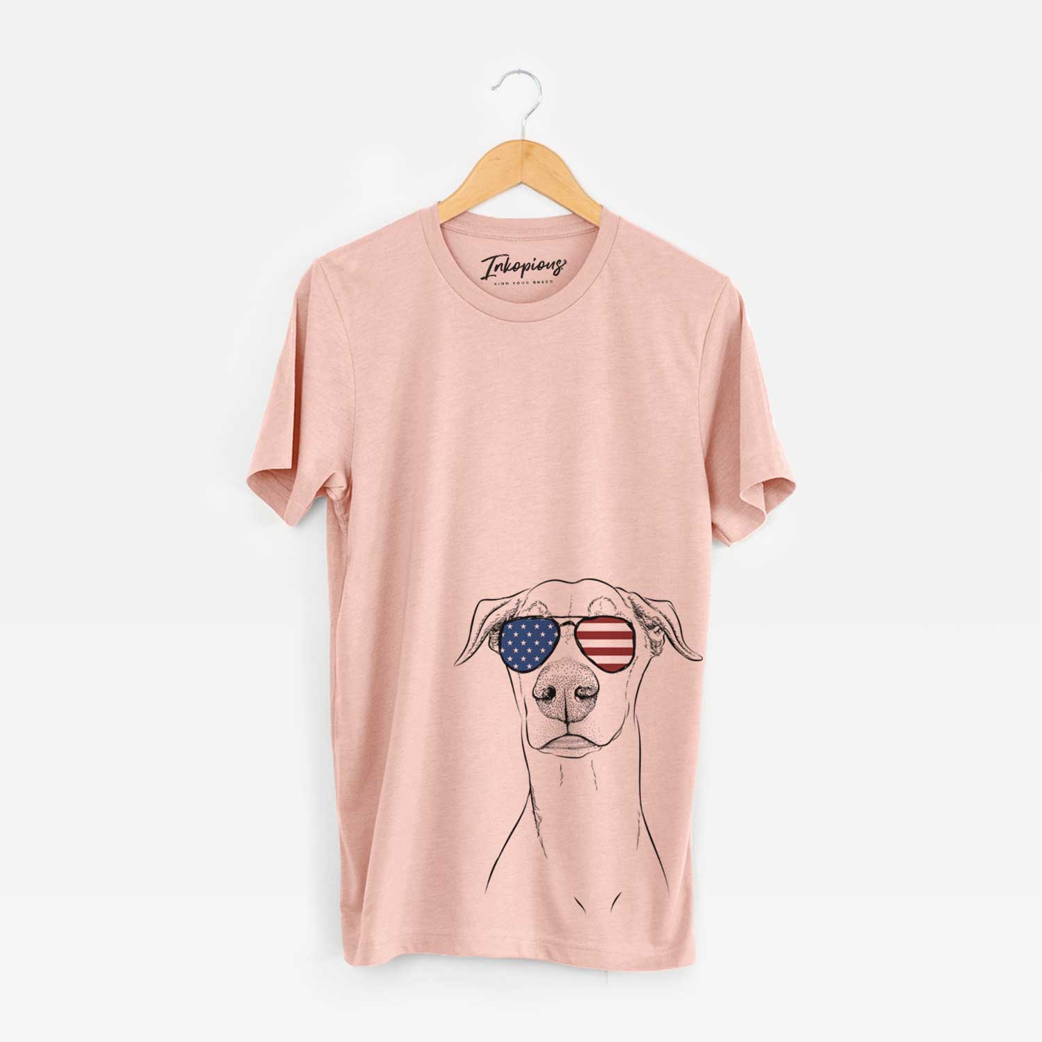 Hand-drawn sketch of Walter the White Doberman Rescue wearing American flag sunglasses on a Peach Unisex crewneck