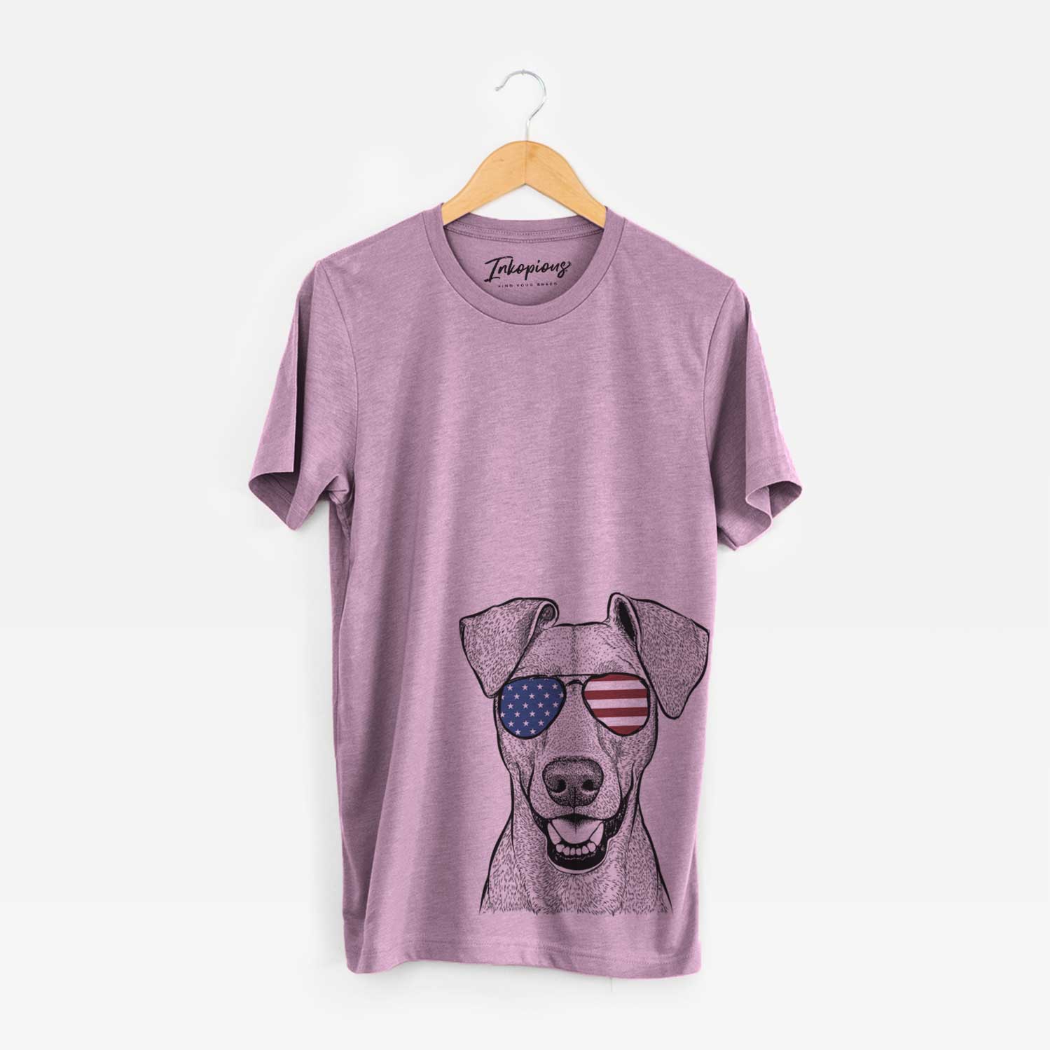 Hand-drawn sketch of Willow the German Pinscher wearing American flag sunglasses on an Orchid Unisex crewneck