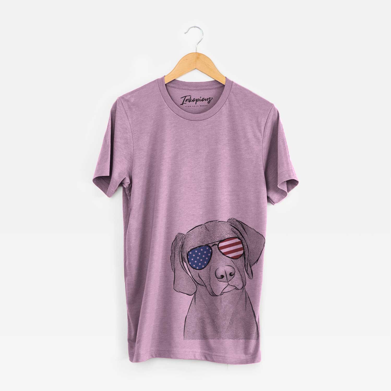 Hand-drawn sketch of Willow the Weizsla wearing American flag sunglasses on an Orchid Unisex crewneck