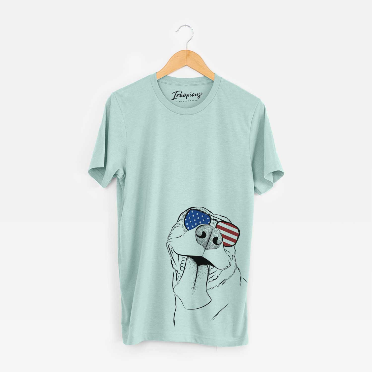 Hand-drawn sketch of Xena the American Staffordshire Terrier wearing American flag sunglasses on a Heather Sage Unisex crewneck