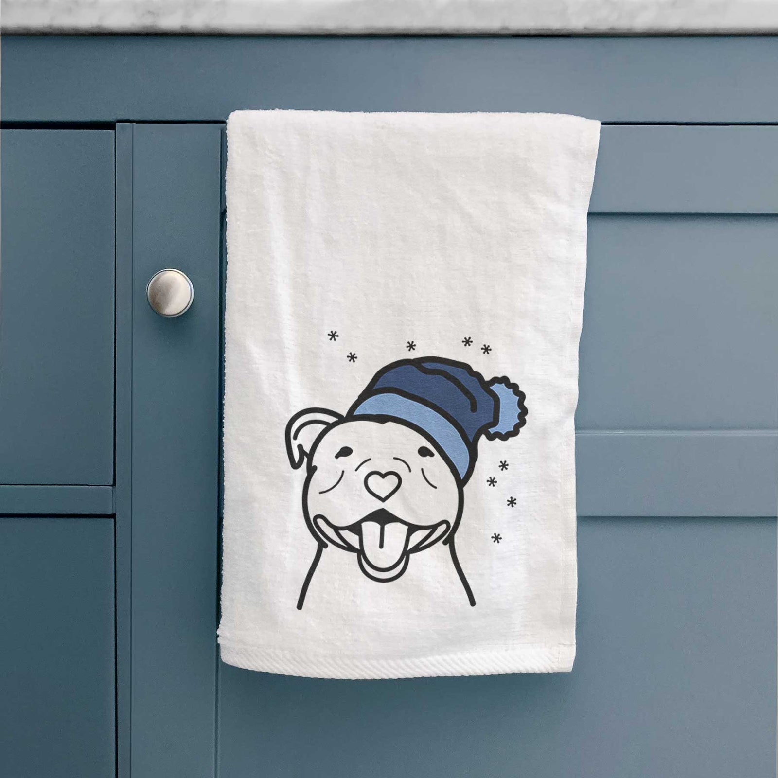 Minimalist line drawing of a Happy American Staffordshire Terrier wearing a winter beanie on a decorative hand towel