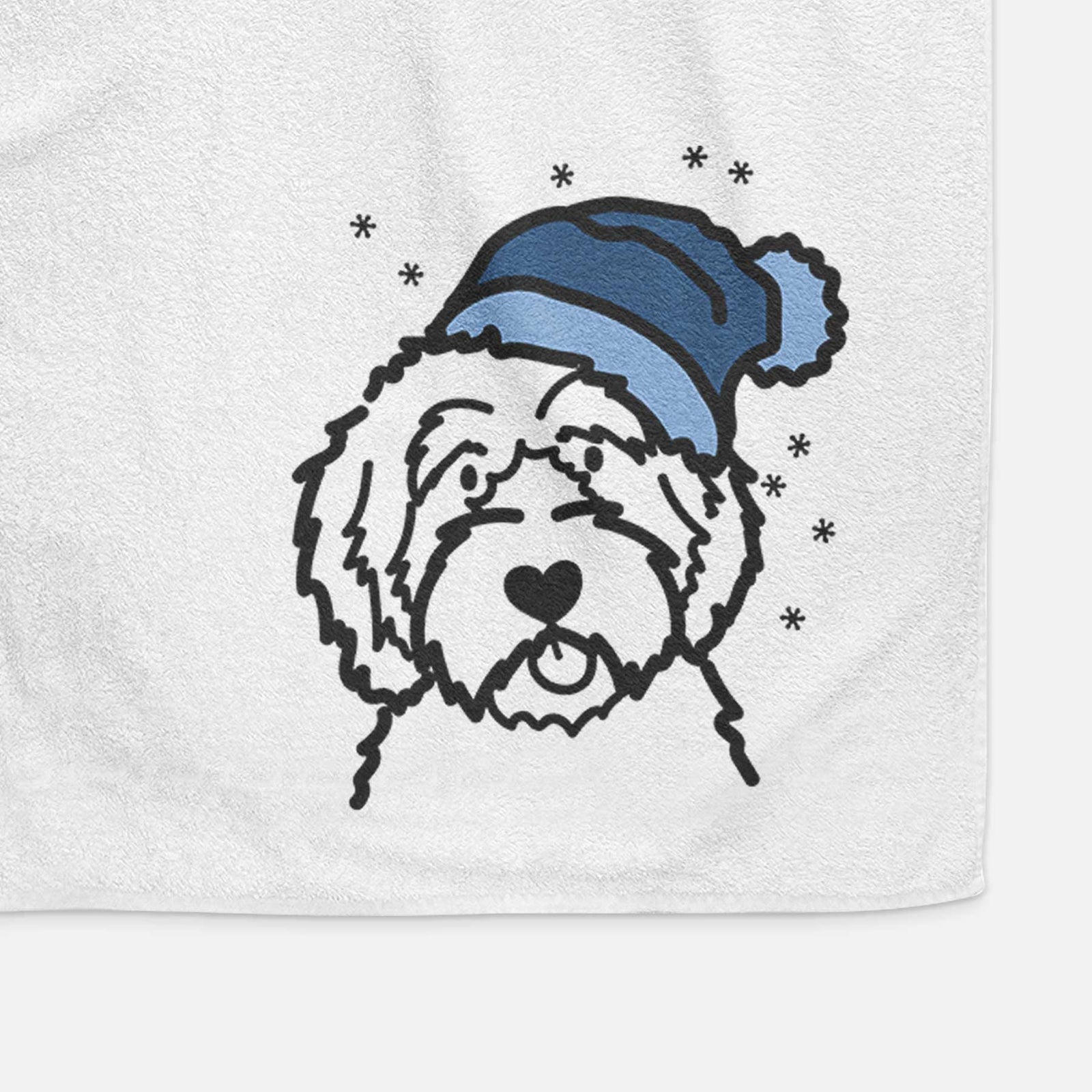 Minimalist line drawing of an Aussiedoodle wearing a winter beanie on a decorative hand towel