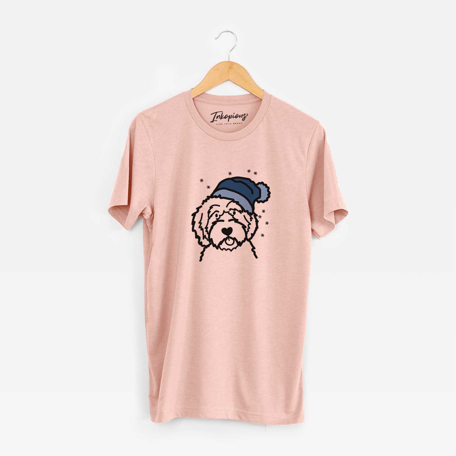 Minimalist line drawing of an Aussiedoodle wearing a winter beanie on a Peach Unisex crewneck