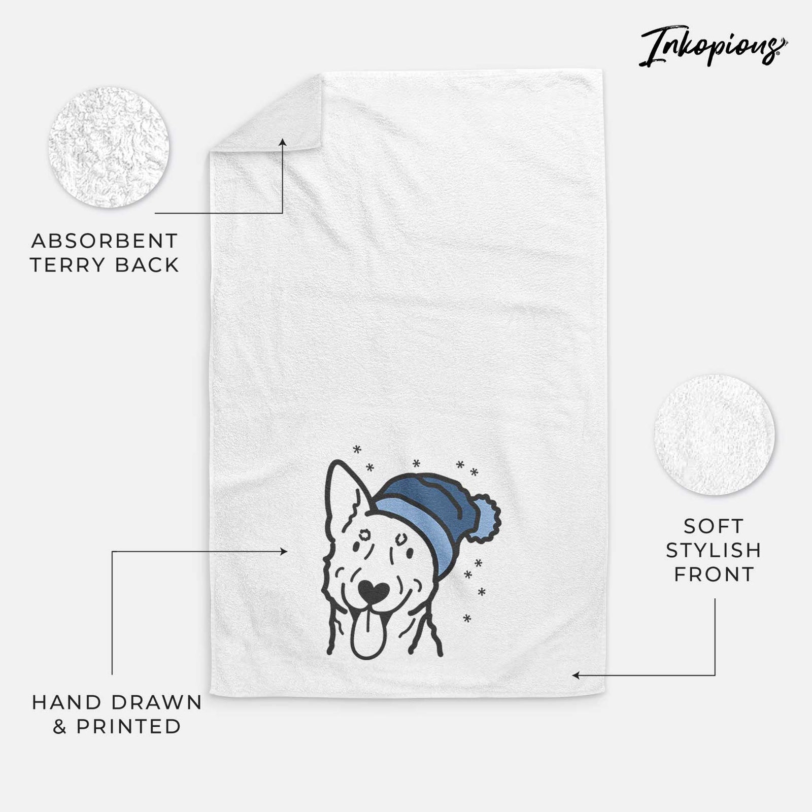 Minimalist line drawing of an Australian Cattle Dog wearing a winter beanie on a decorative hand towel