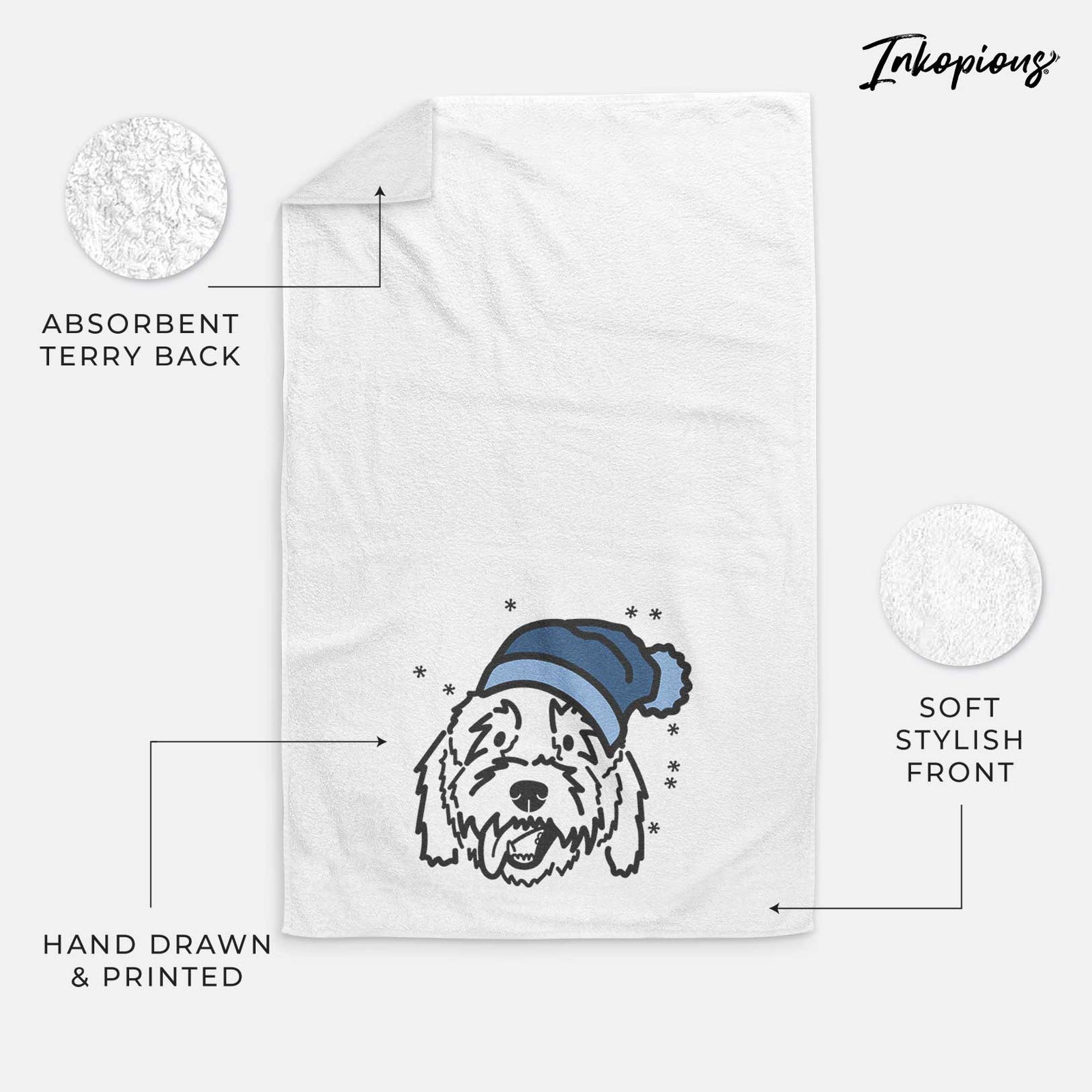 Minimalist line drawing of Barry the Goldendoodle wearing a winter beanie on a decorative hand towel
