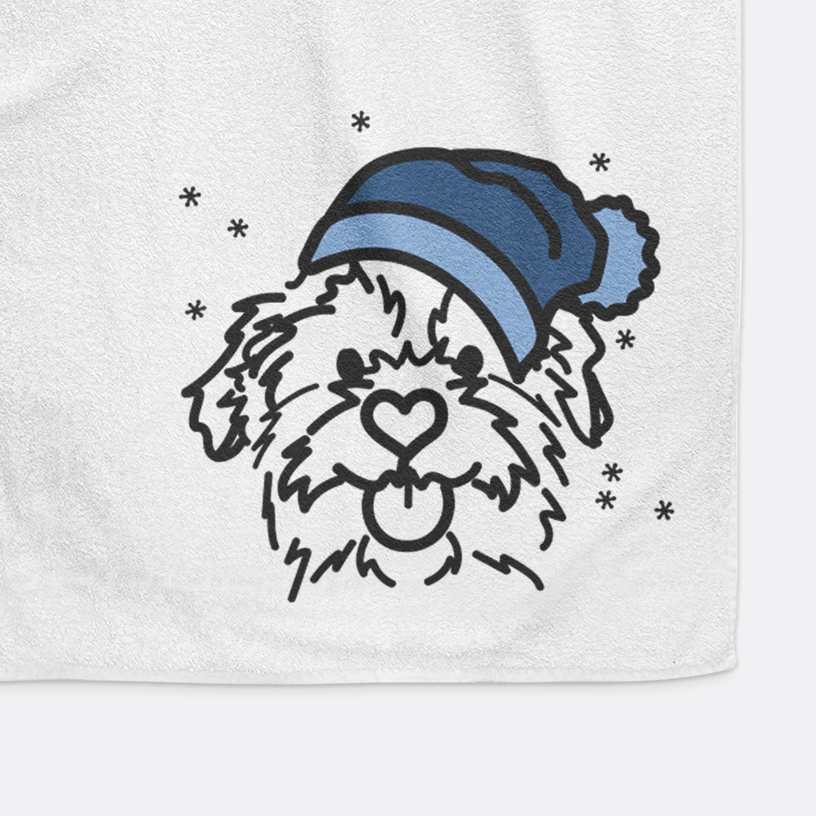 Minimalist line drawing of Bea the Mixed Breed wearing a winter beanie on a decorative hand towel