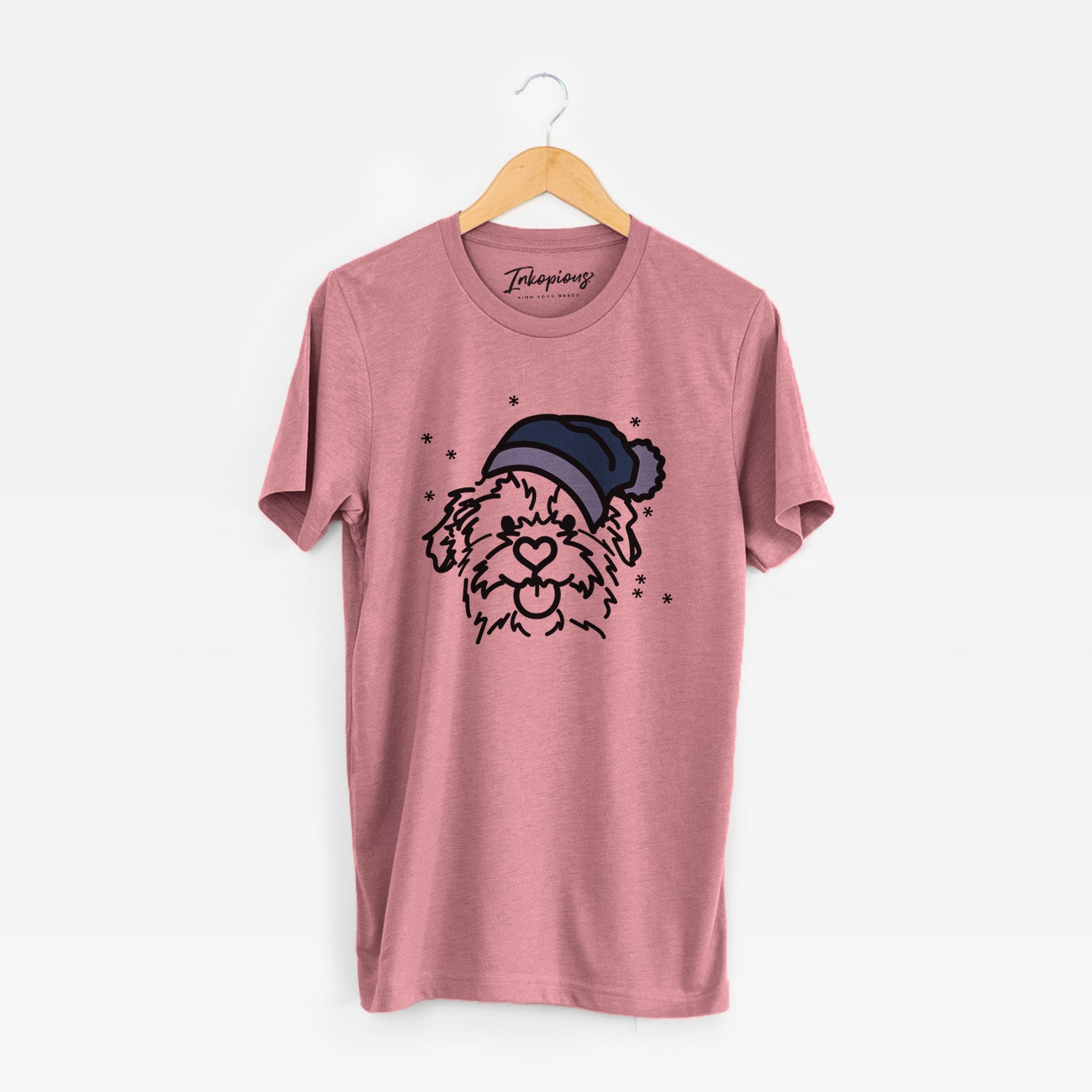 Minimalist line drawing of Bea the Mixed Breed wearing a winter beanie on a Mauve Unisex crewneck