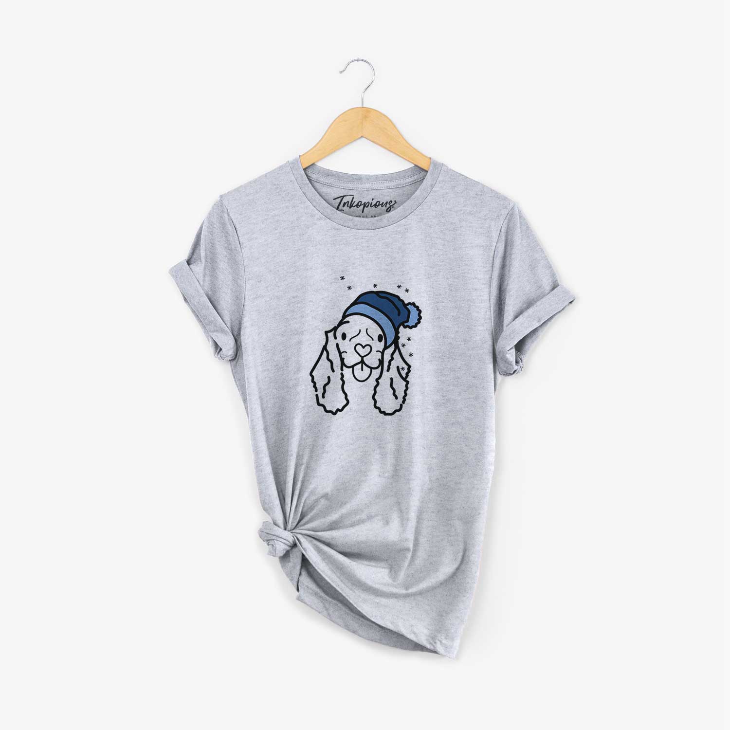 Minimalist line drawing of Bella the American Cocker Spaniel wearing a winter beanie on a Grey Unisex crewneck