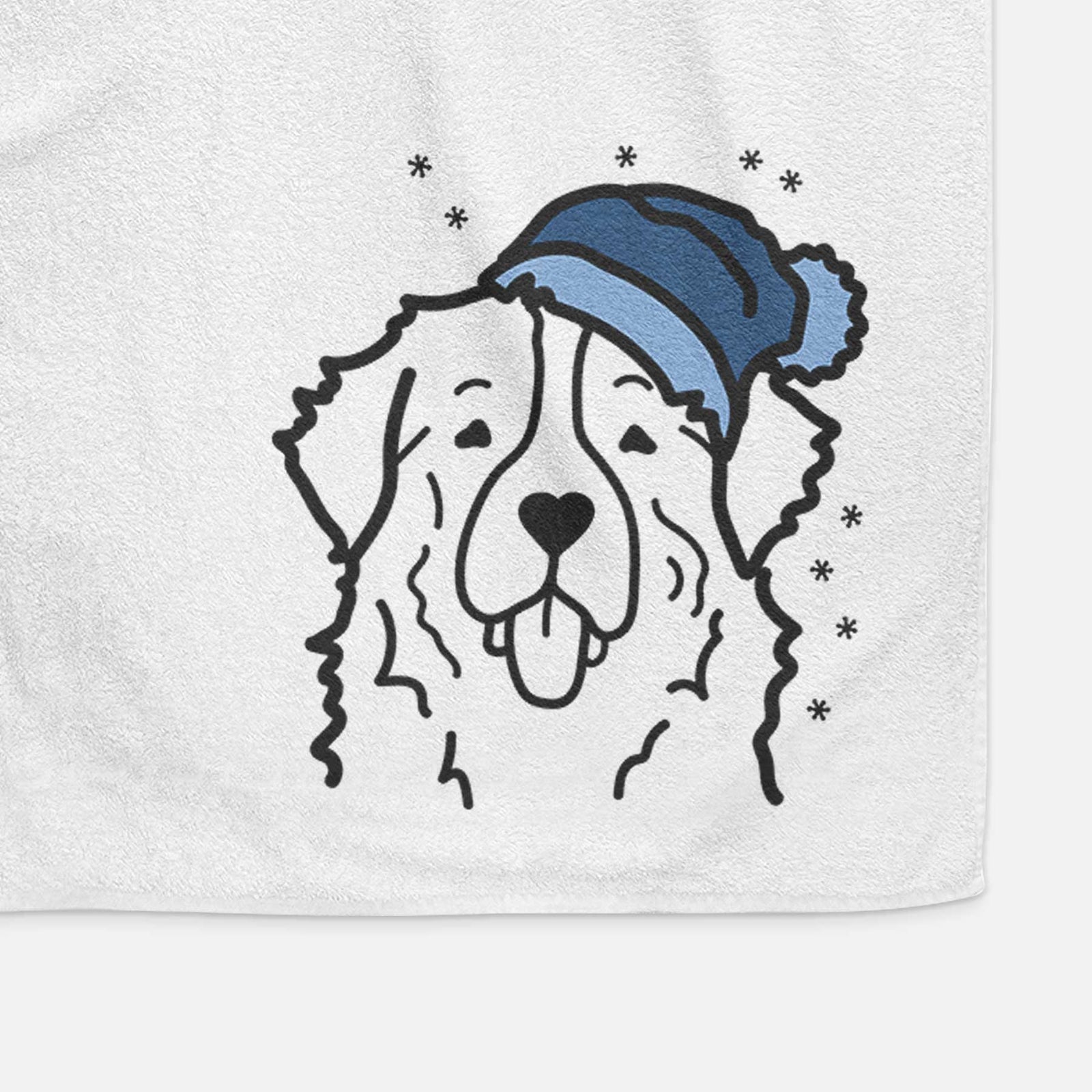 Minimalist line drawing of a Bernese Mountain Dog wearing a winter beanie on a decorative hand towel