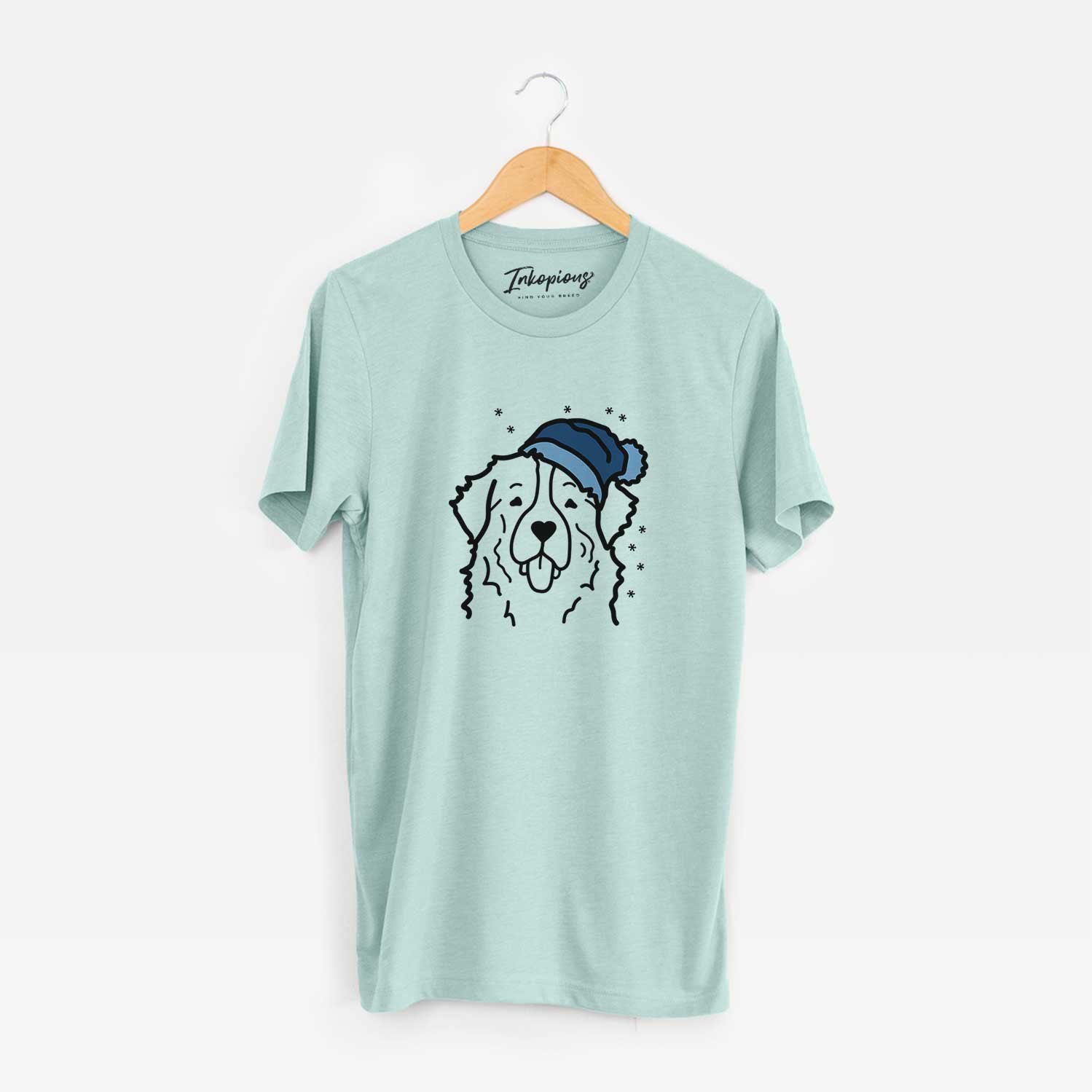 Minimalist line drawing of a Bernese Mountain Dog wearing a winter beanie on a Heather Sage Unisex crewneck