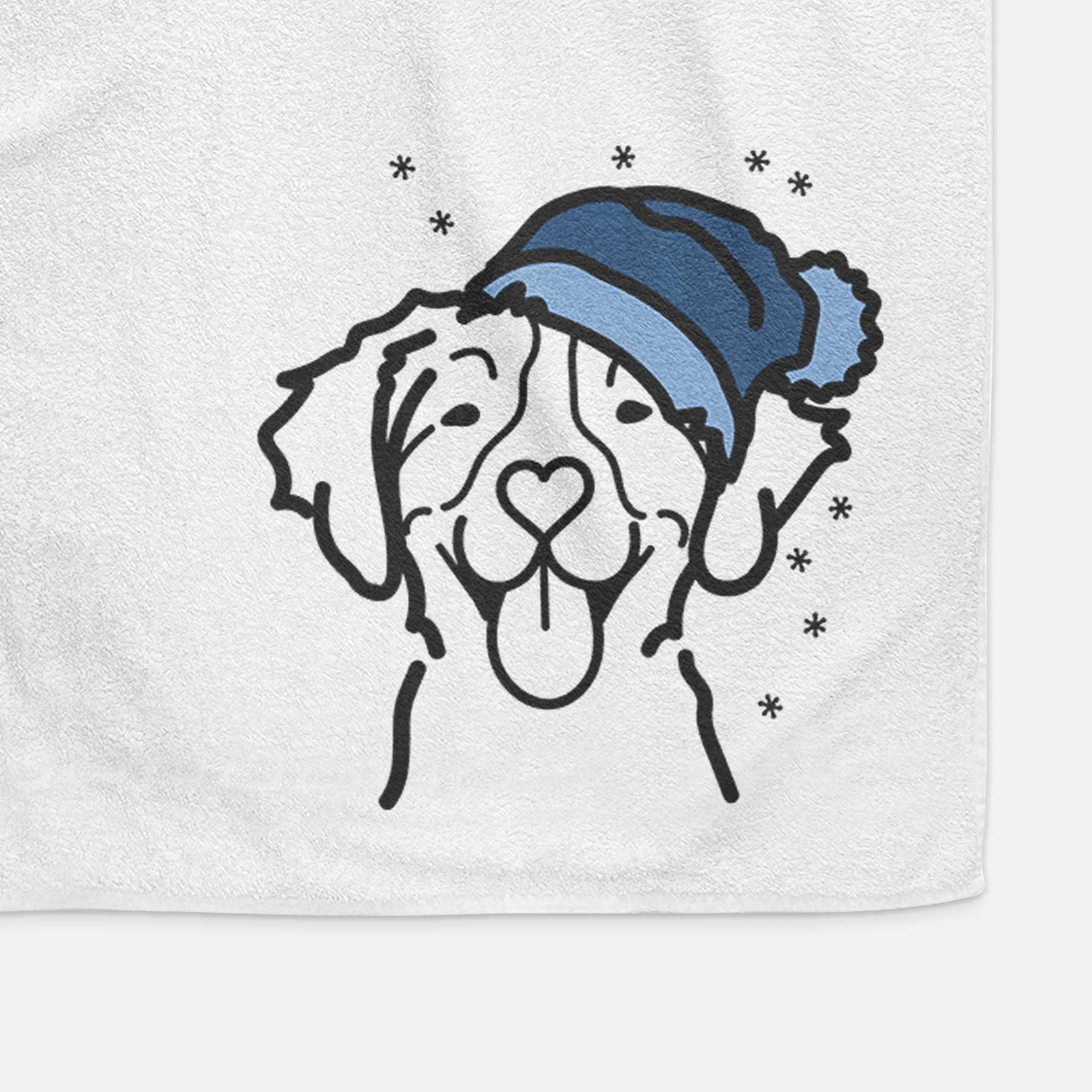 Minimalist line drawing of a Brittany wearing a winter beanie on a decorative hand towel