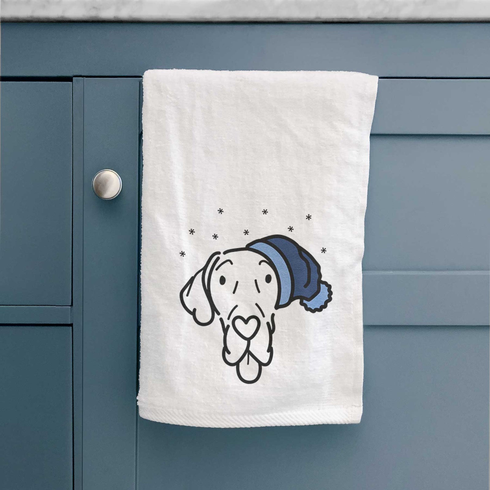 Minimalist line drawing of Bruce the Great Dane wearing a winter beanie on a decorative hand towel