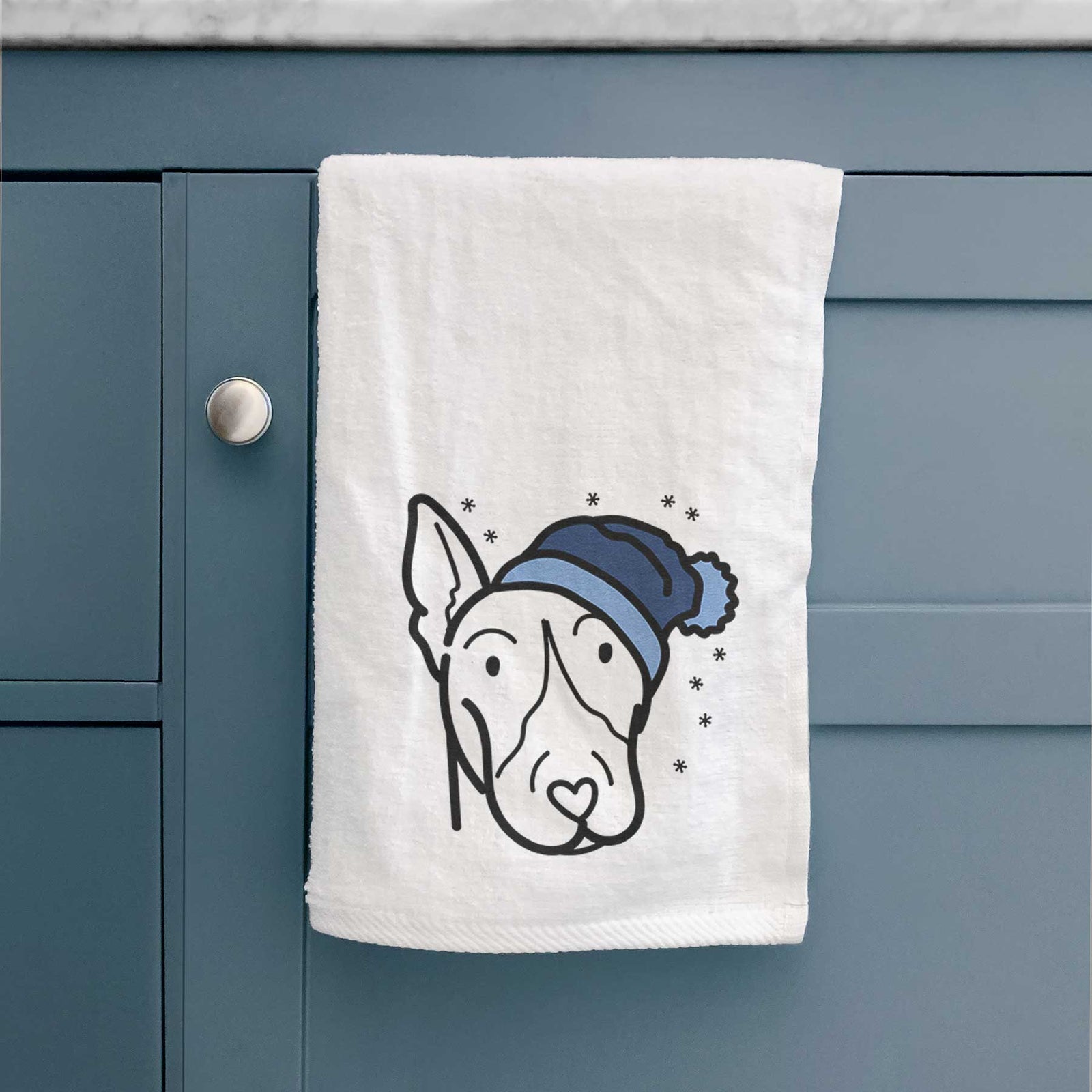 Minimalist line drawing of a Bull Terrier wearing a winter beanie on a decorative hand towel