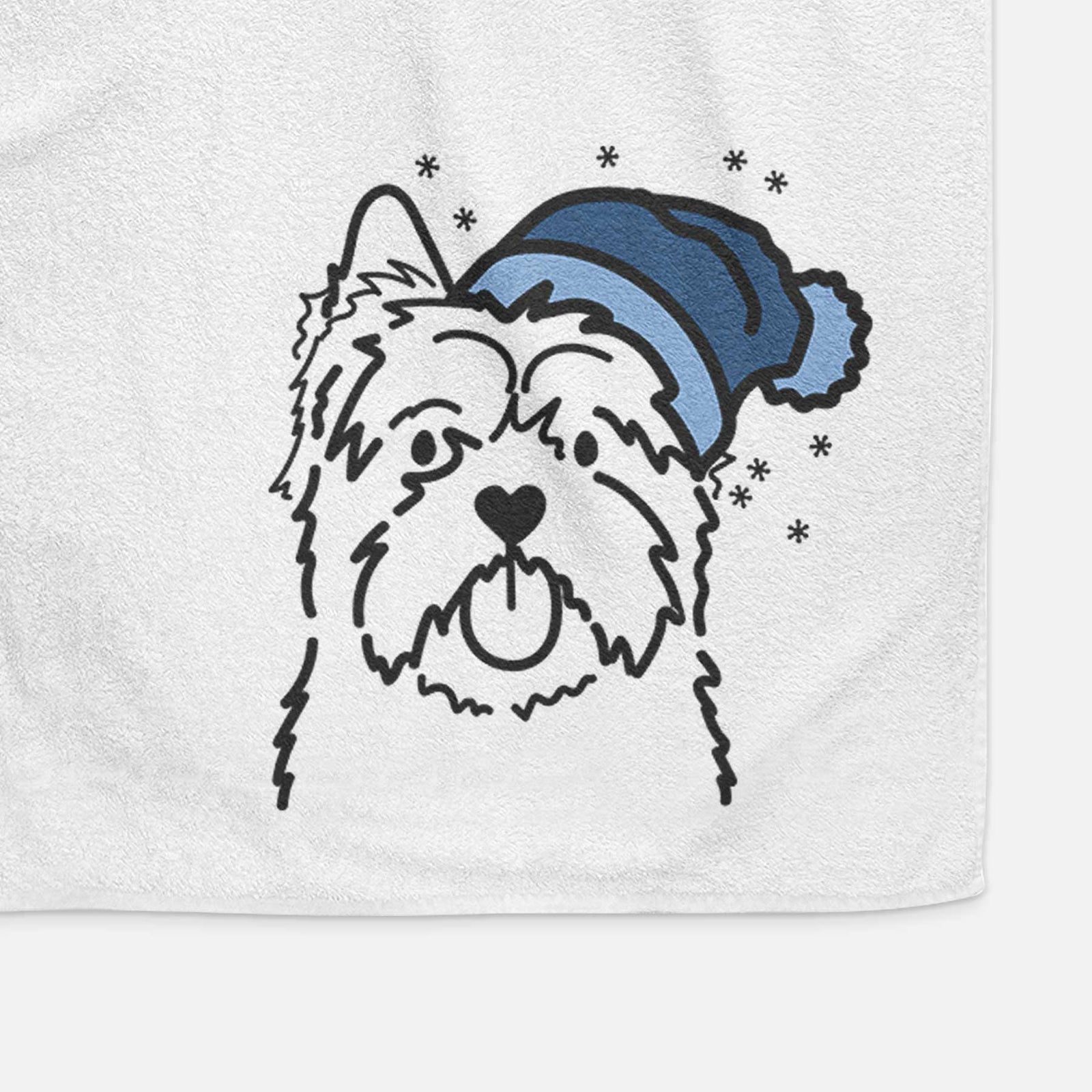 Minimalist line drawing of a Cairn Terrier wearing a winter beanie on a decorative hand towel