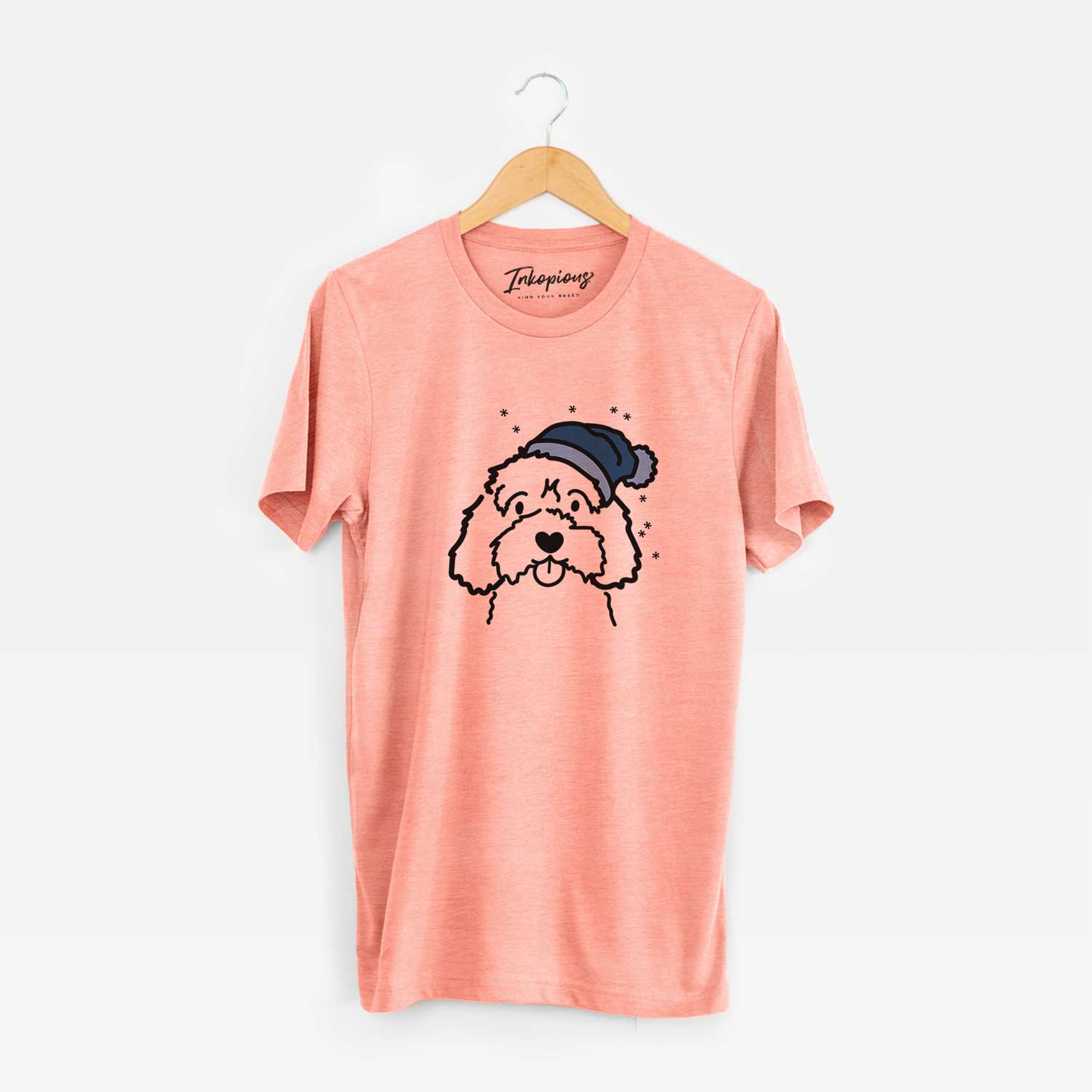 Minimalist line drawing of a Cavapoo wearing a winter beanie on a Sunset Unisex crewneck