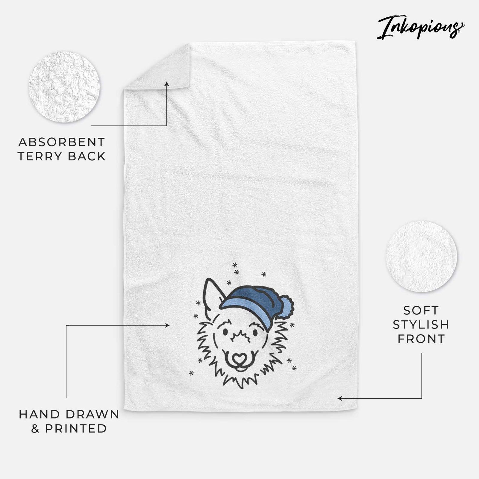 Minimalist line drawing of Chewy the Super Mutt wearing a winter beanie on a decorative hand towel