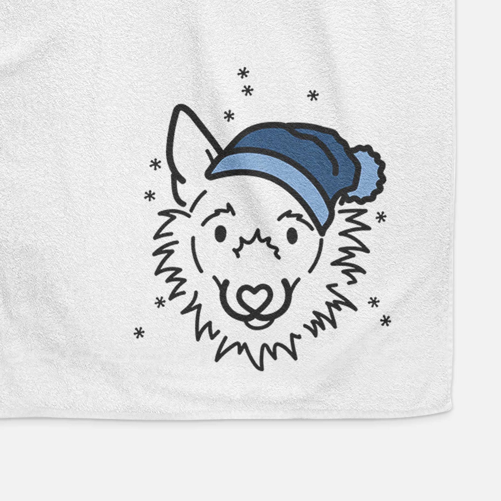 Minimalist line drawing of Chewy the Super Mutt wearing a winter beanie on a decorative hand towel