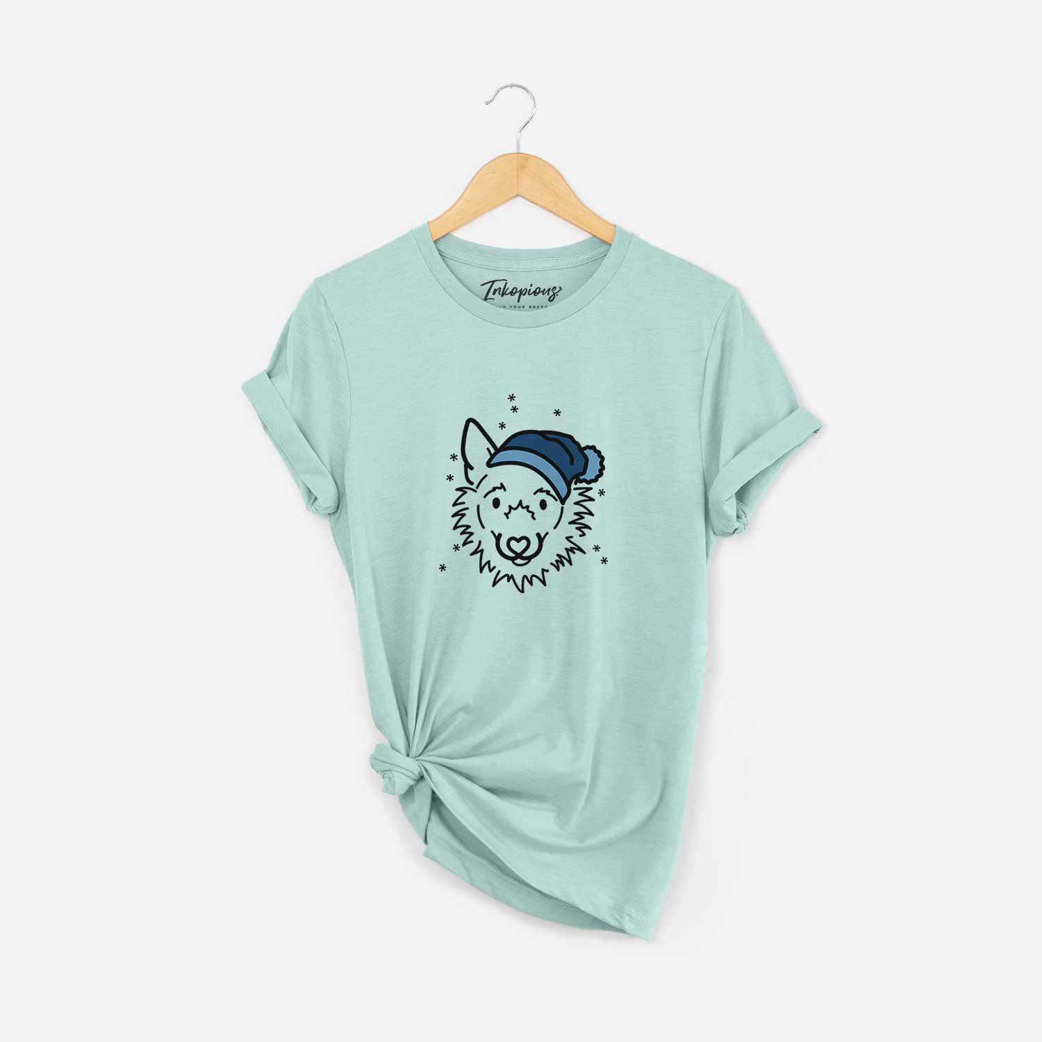 Minimalist line drawing of Chewy the Super Mutt wearing a winter beanie on a Heather Sage Unisex crewneck