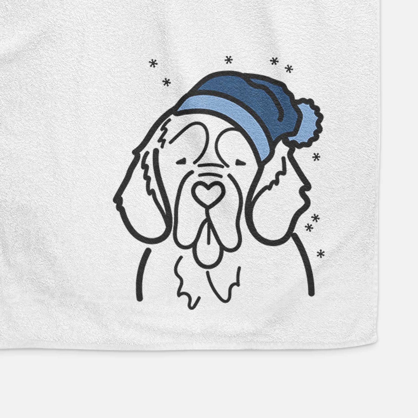 Minimalist line drawing of a Clumber Spaniel wearing a winter beanie on a decorative hand towel