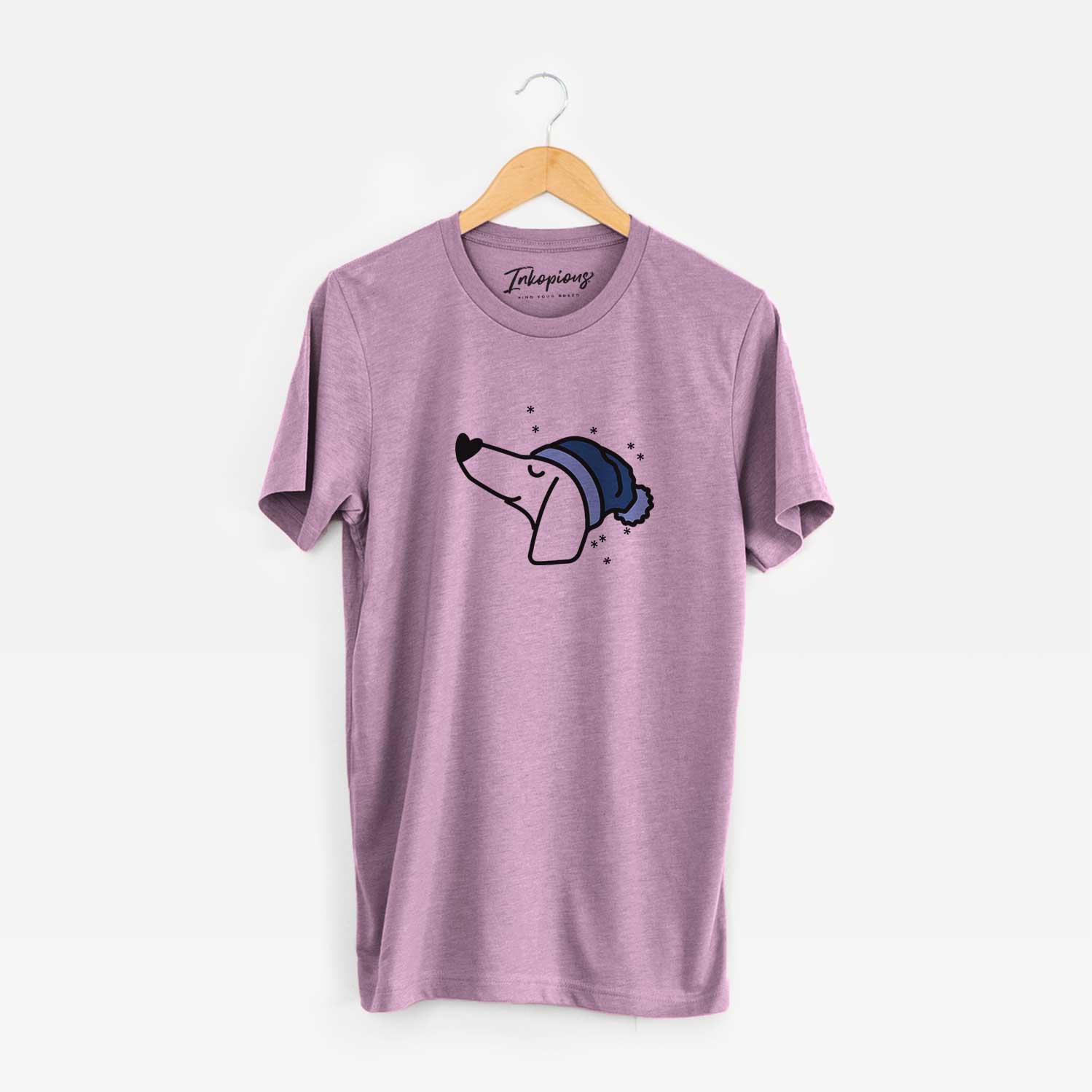 Minimalist line drawing of a Dachshund wearing a winter beanie on an Orchid Unisex crewneck