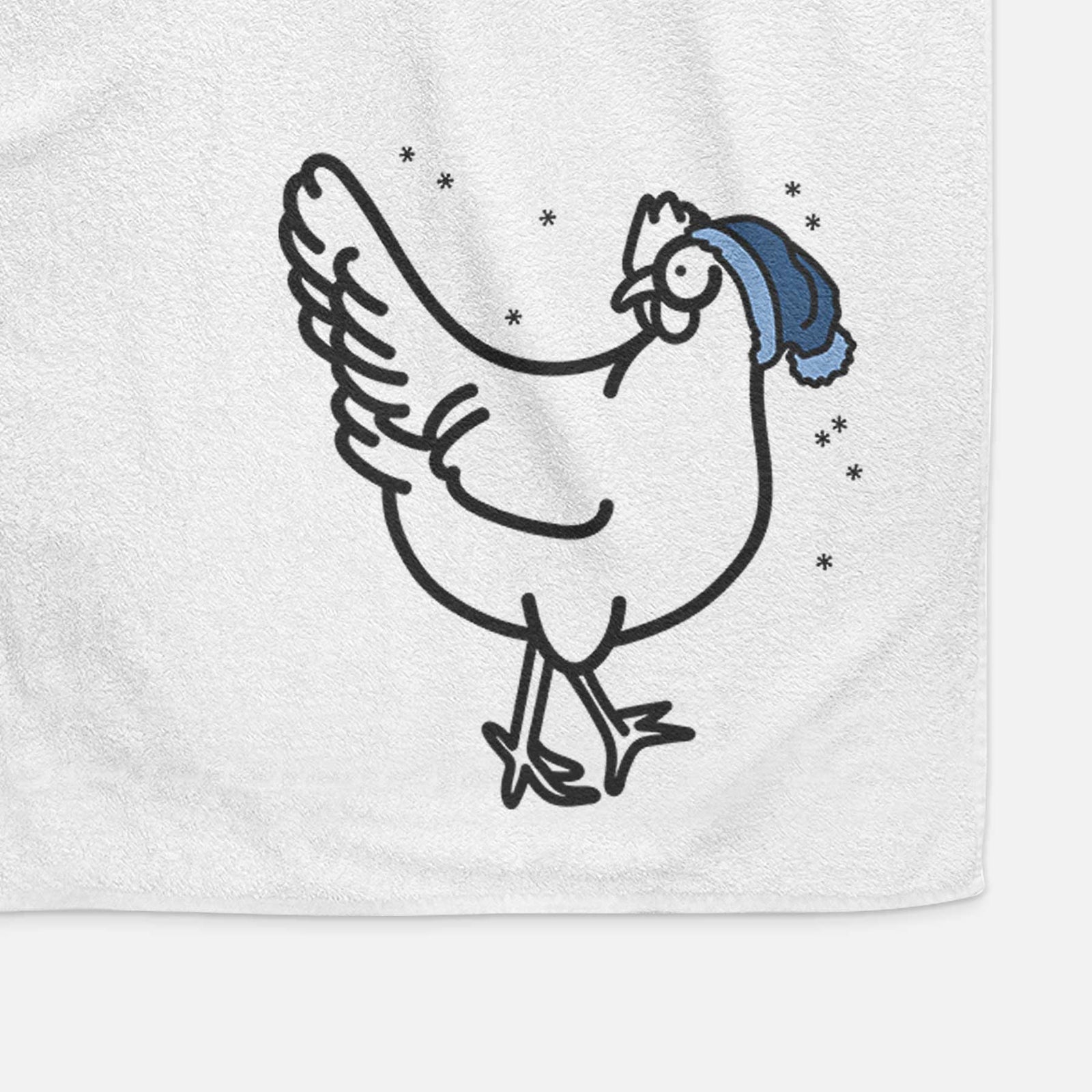 Minimalist line drawing of Daisy the Chicken wearing a winter beanie on a decorative hand towel