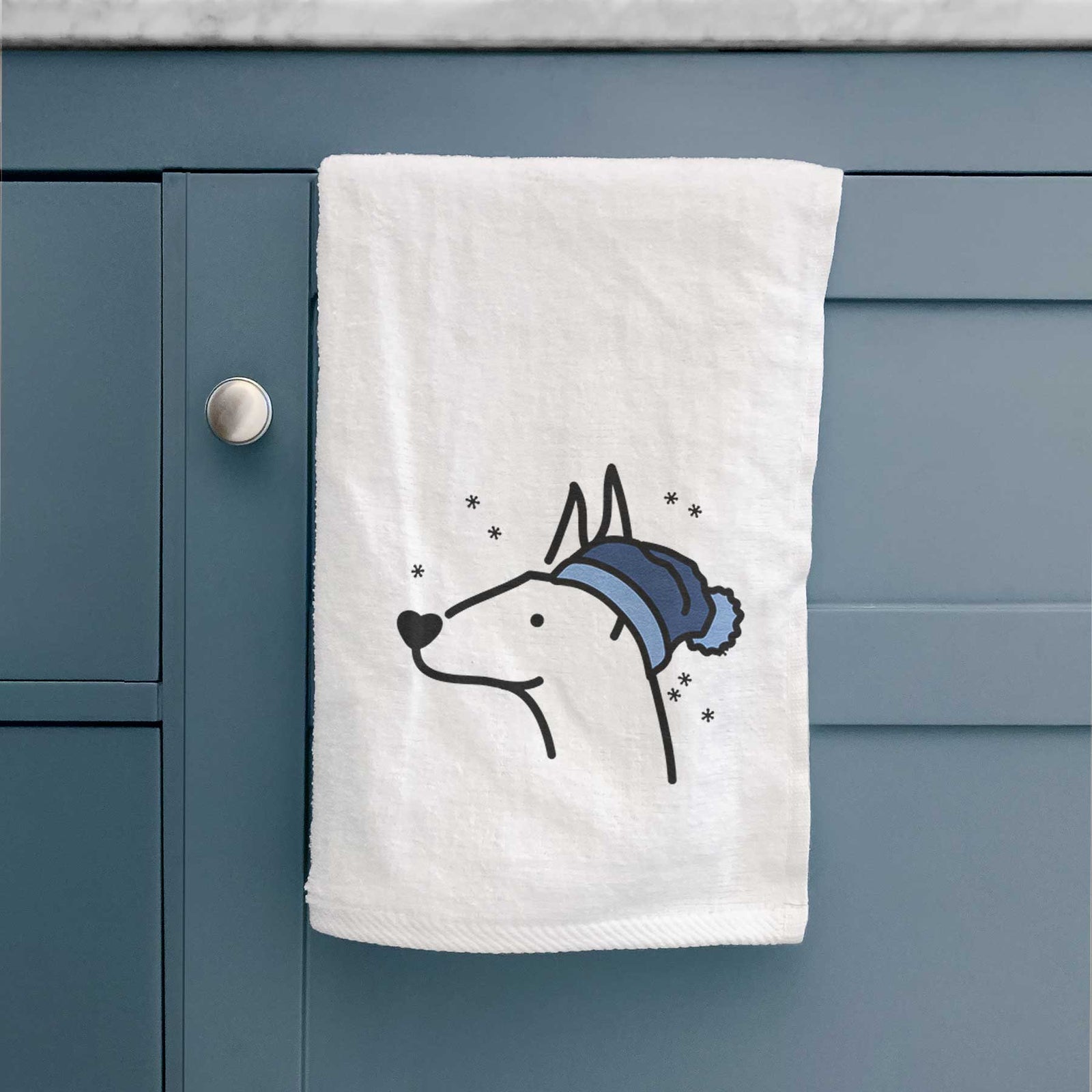 Minimalist line drawing of a Doberman Pinscher wearing a winter beanie on a decorative hand towel