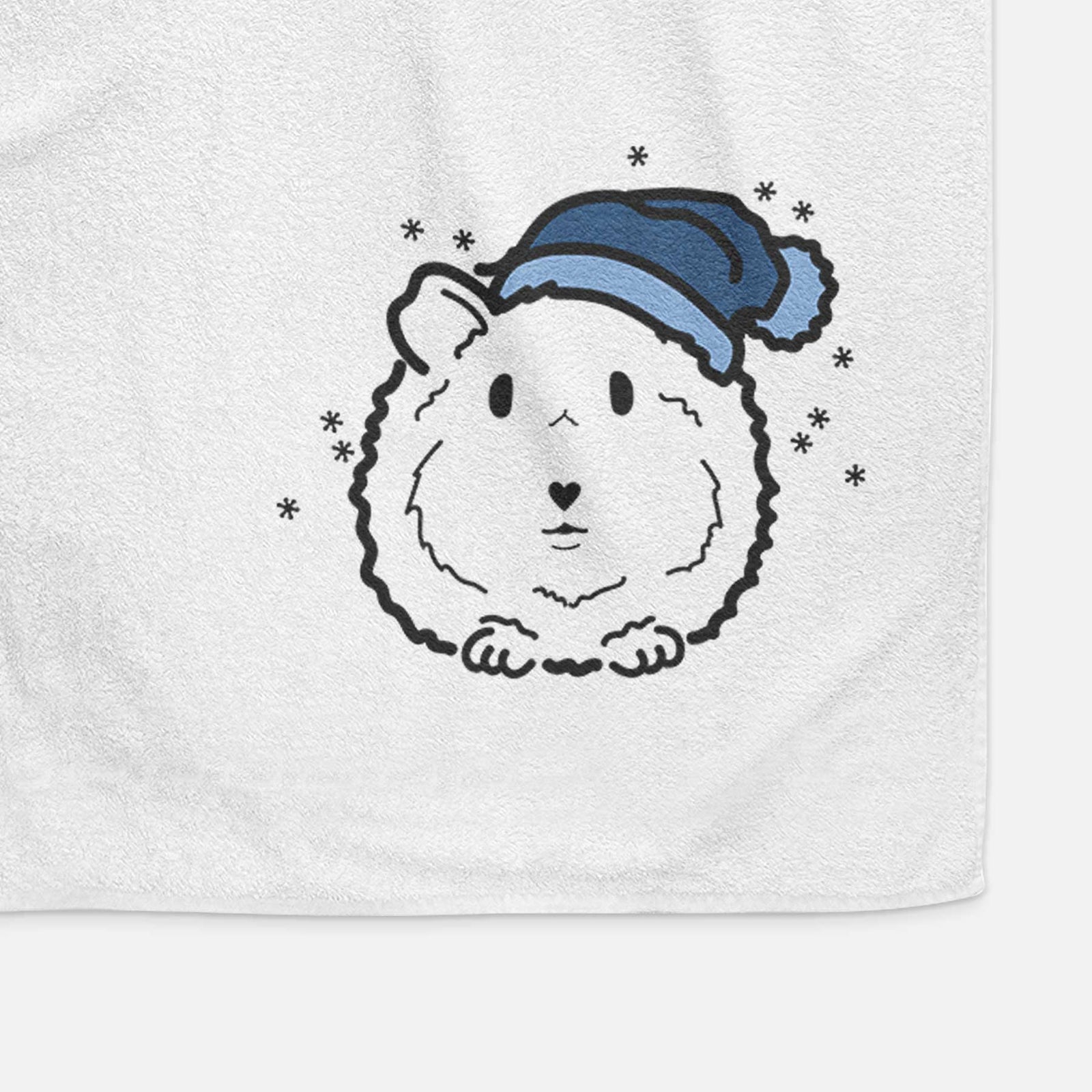 Minimalist line drawing of Duke the Guinea Pig wearing a winter beanie on a decorative hand towel