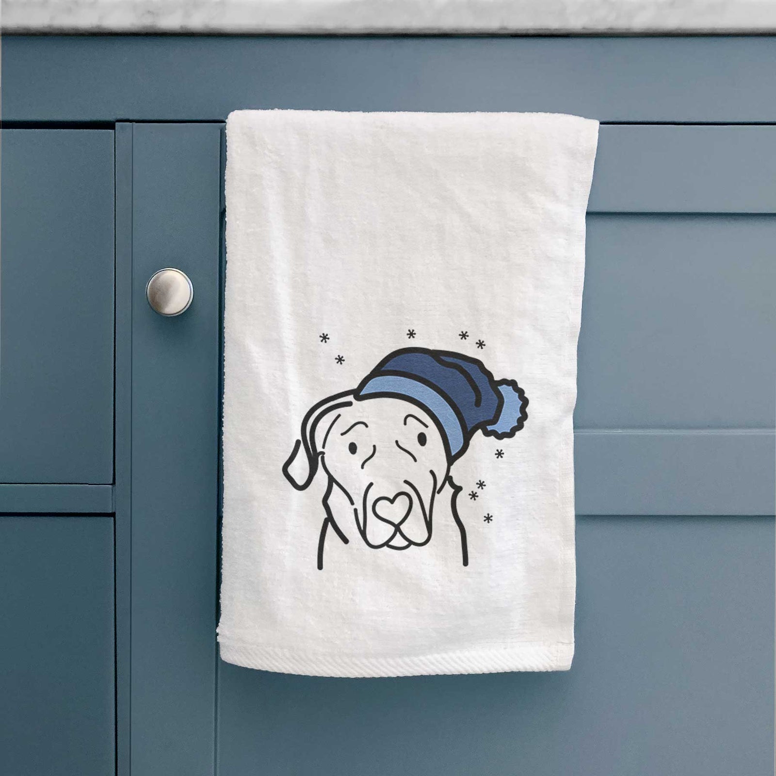 Minimalist line drawing of an English Labrador wearing a winter beanie on a decorative hand towel