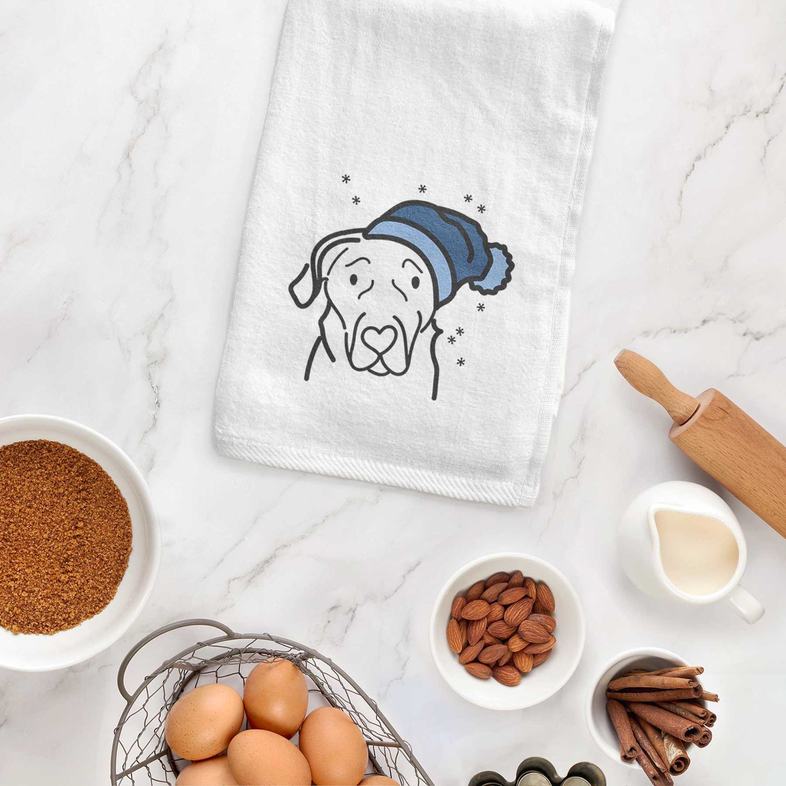 Minimalist line drawing of an English Labrador wearing a winter beanie on a decorative hand towel