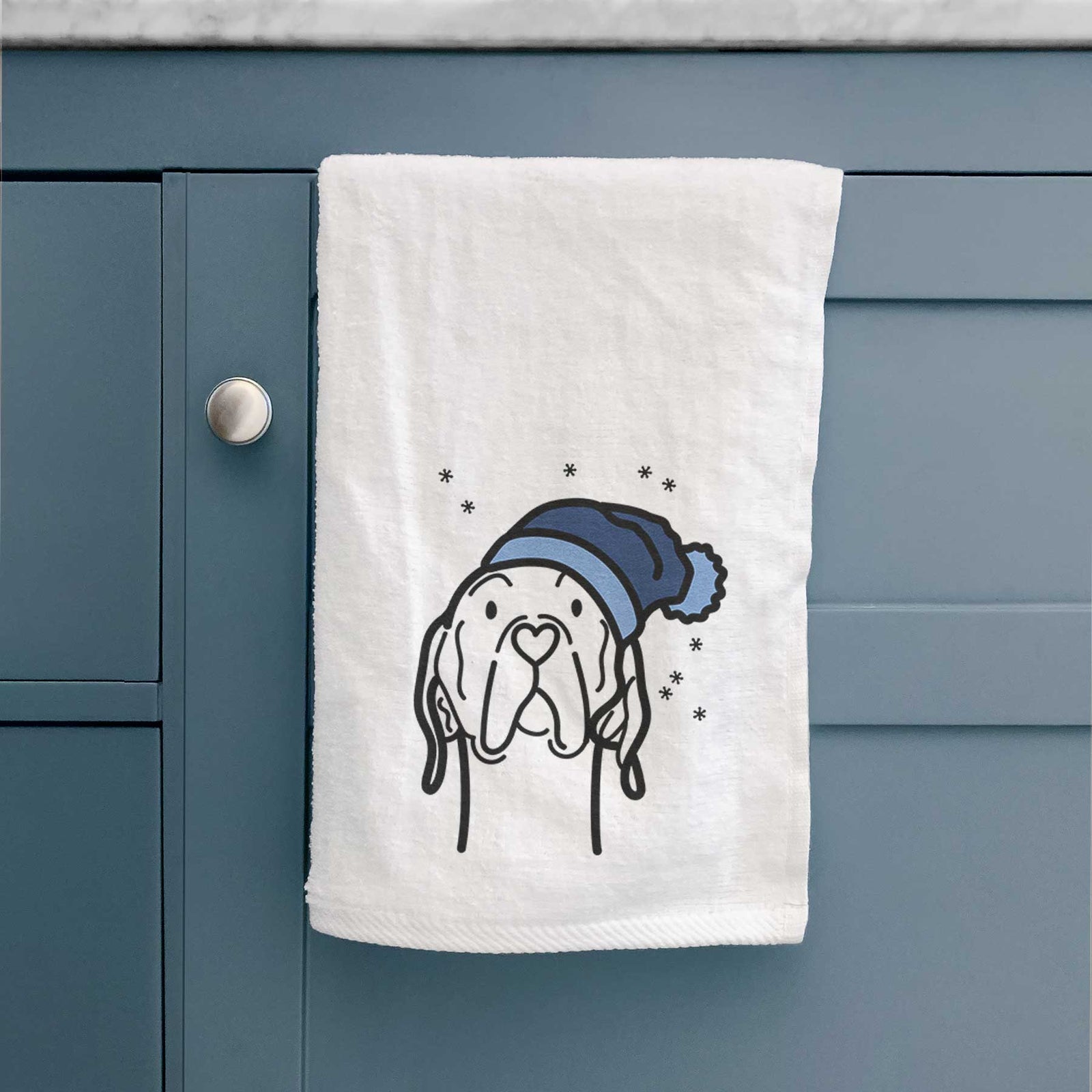 Minimalist line drawing of an English Pointer wearing a winter beanie on a decorative hand towel