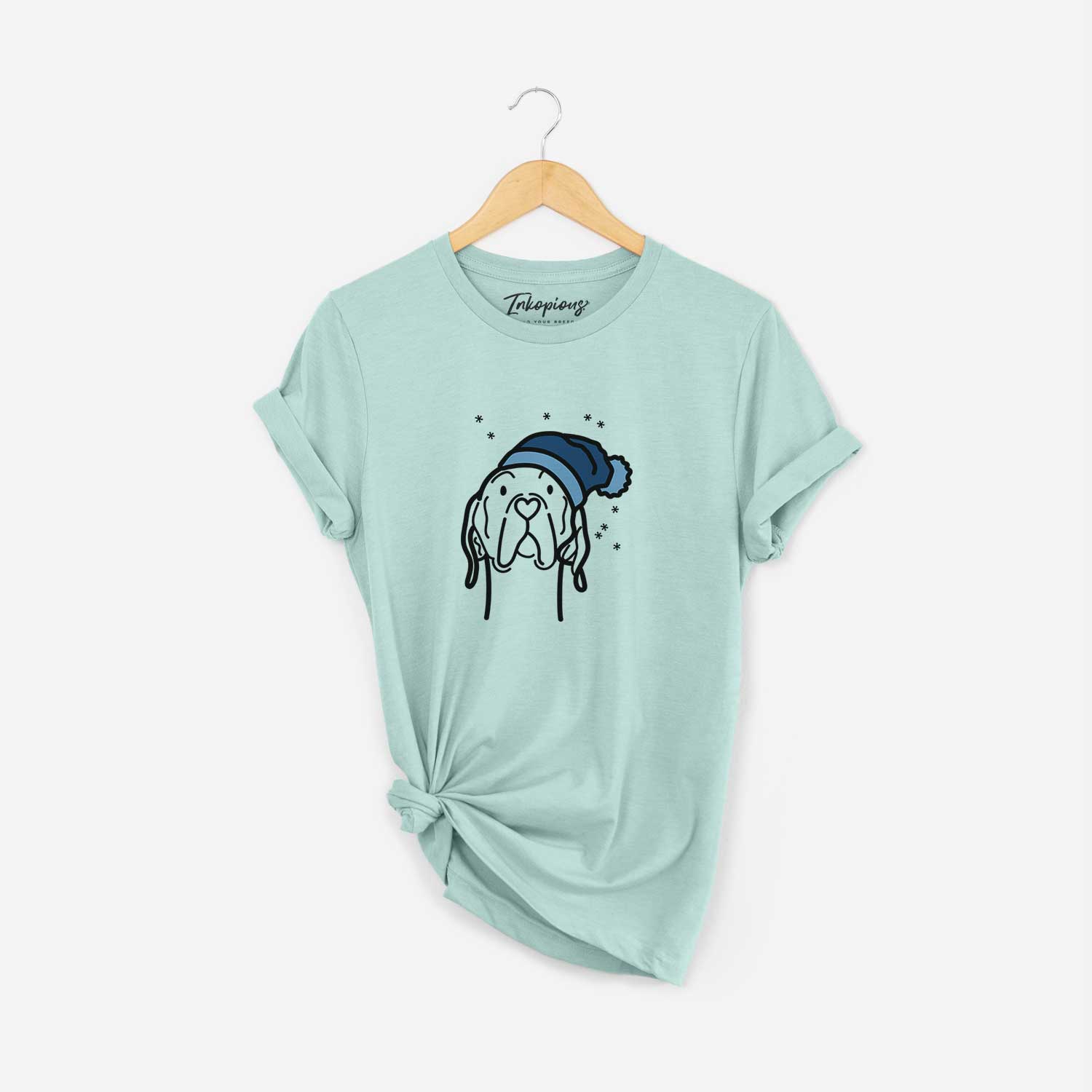 Minimalist line drawing of an English Pointer wearing a winter beanie on a Heather Sage Unisex crewneck
