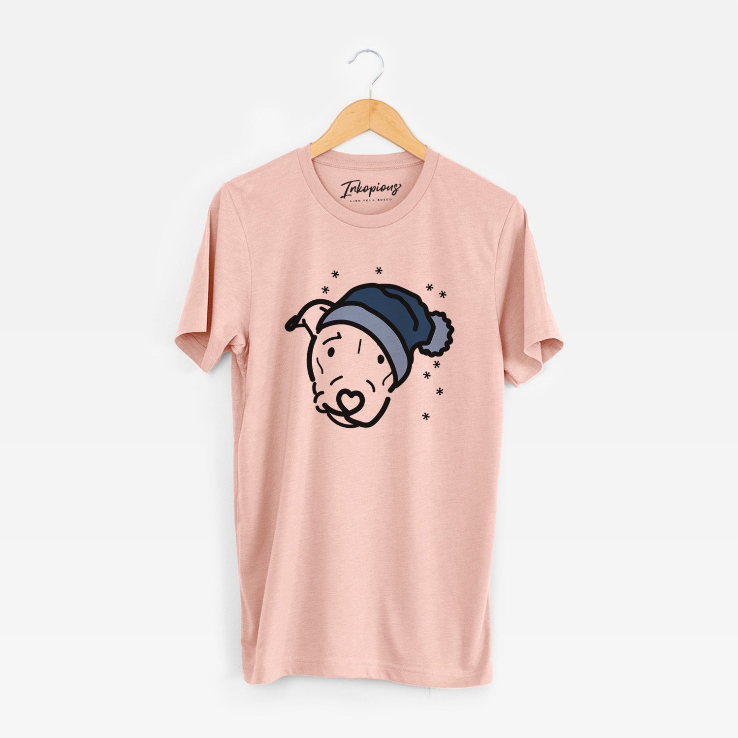 Minimalist line drawing of Ernie the Pitbull Mix wearing a winter beanie on a Peach Unisex crewneck