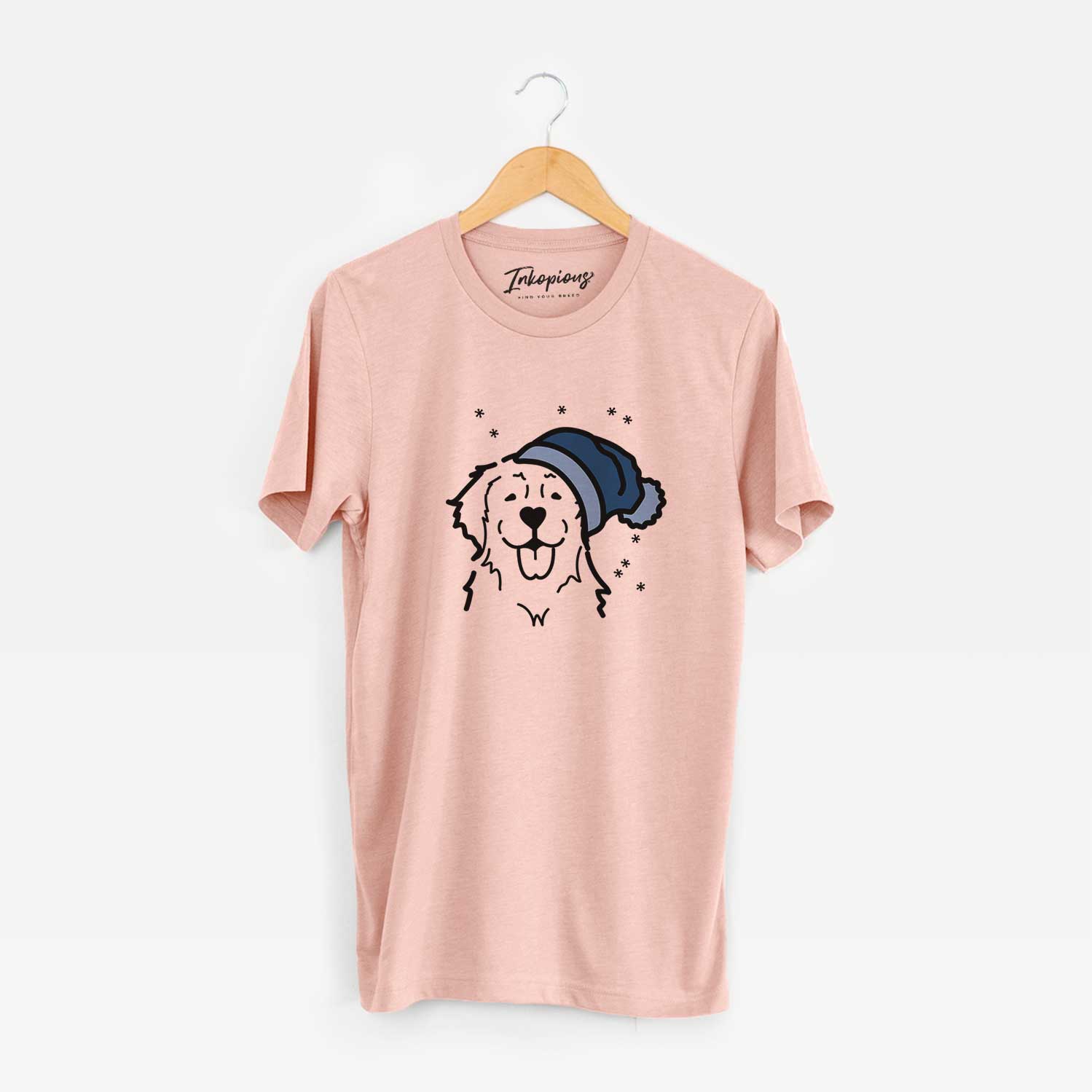 Minimalist line drawing of a Golden Retriever wearing a winter beanie on a Peach Unisex crewneck