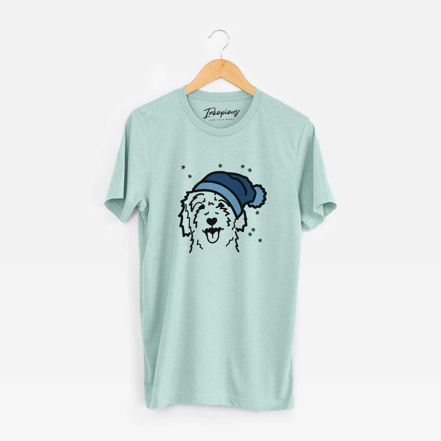 Minimalist line drawing of a Goldendoodle wearing a winter beanie on a Heather Sage Unisex crewneck