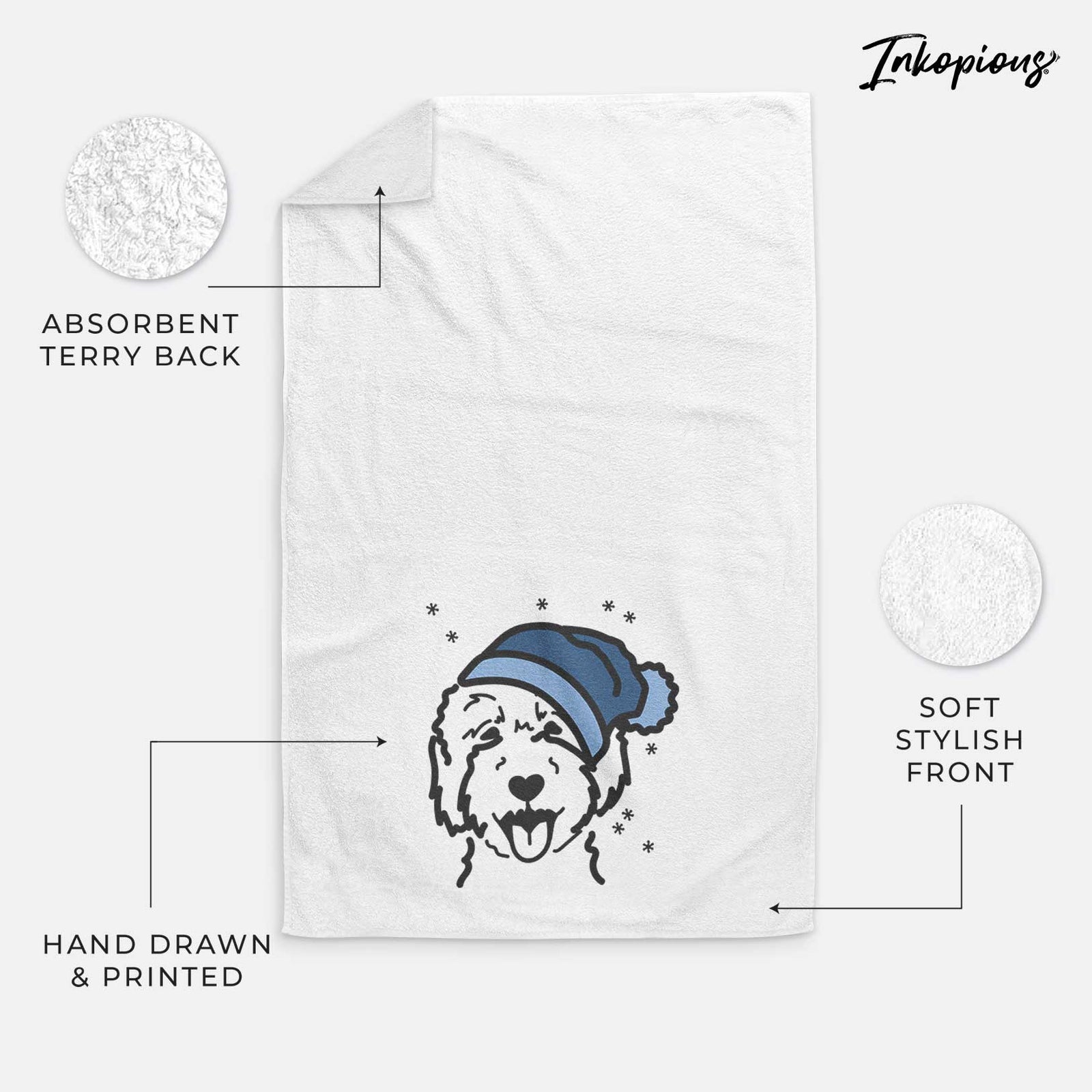 Minimalist line drawing of a Goldendoodle 2 wearing a winter beanie on a decorative hand towel